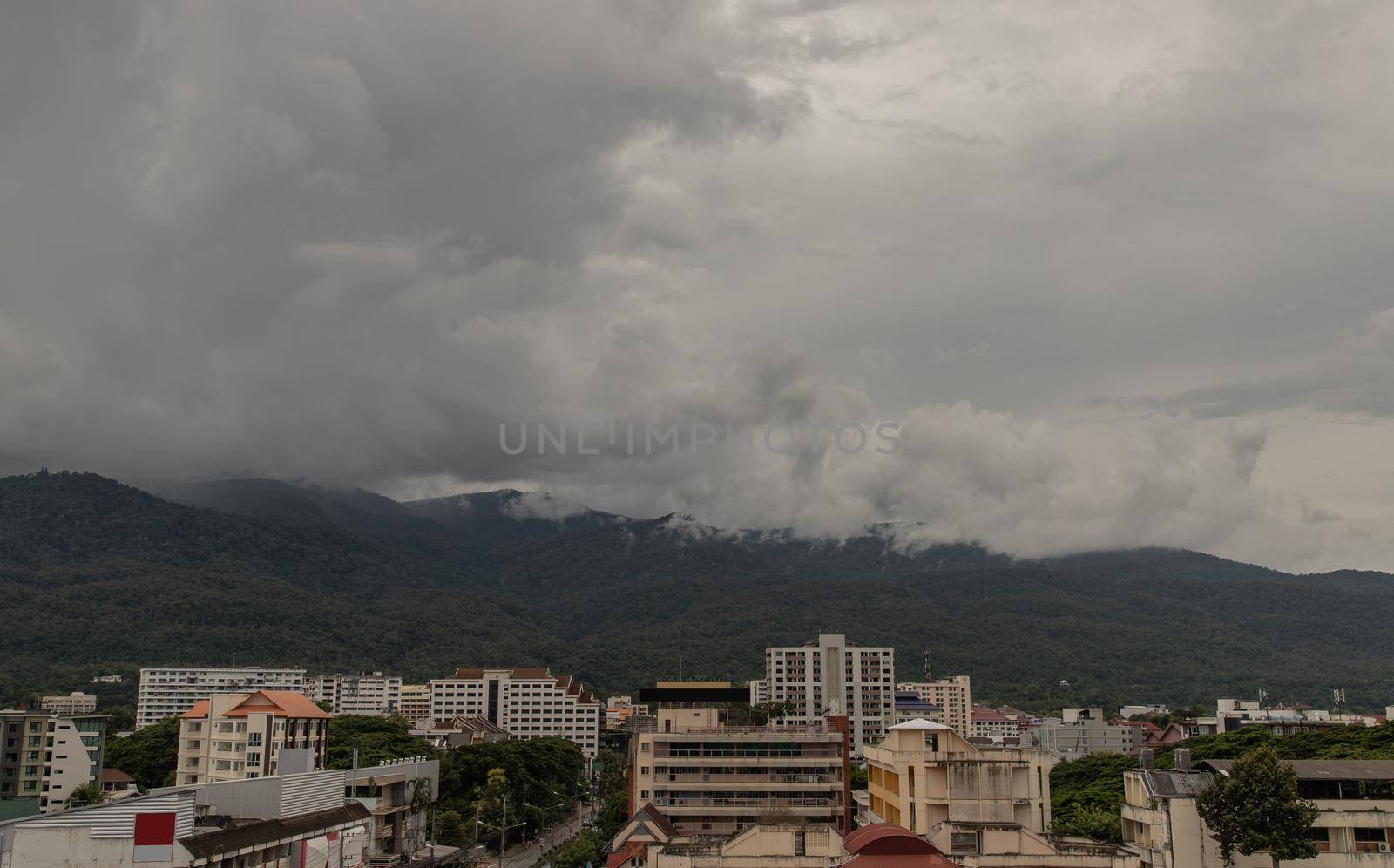 View City in Chaing mai and Doi Suthep mountain in background at Thailand. No focus, specifically.