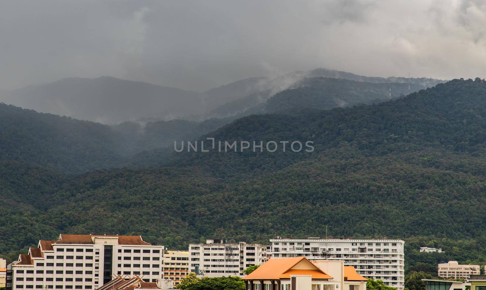 View City in Chaing mai and Doi Suthep mountain in background at Thailand. No focus, specifically.