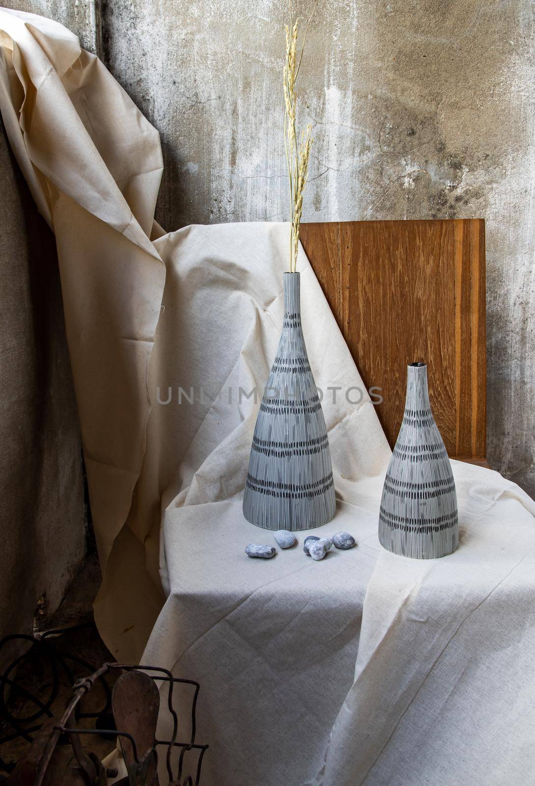 Handmade Double ceramic Vases on wooden chair. Home decor, Space for text.