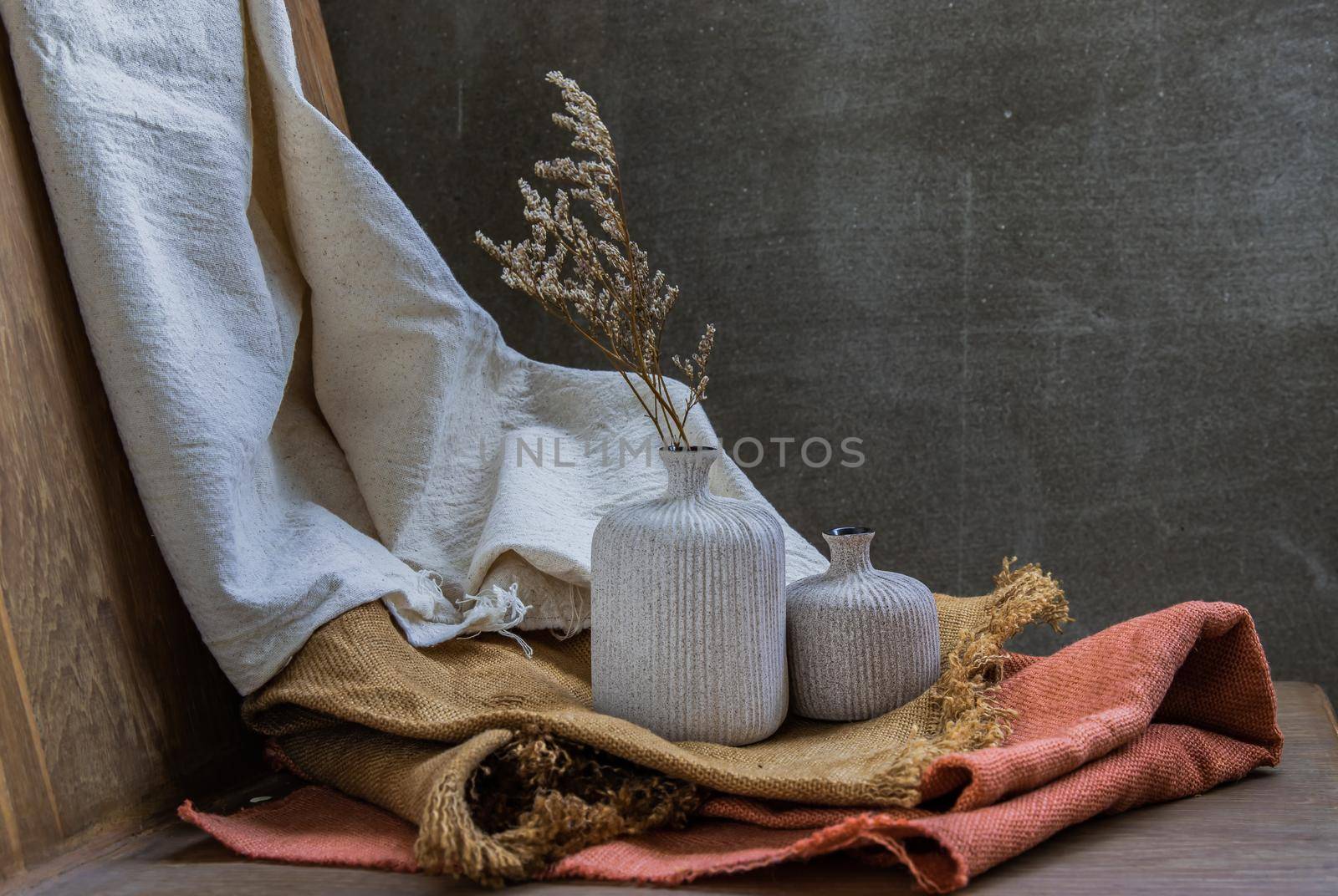 Handmade Double ceramic Vases on wooden chair. Home decor, Space for text.