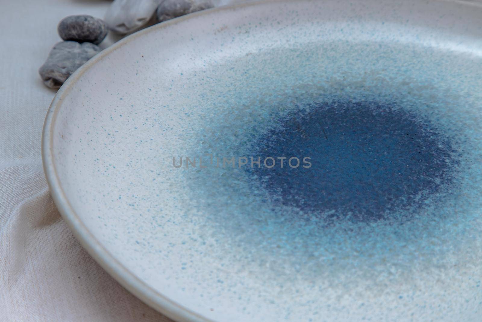 Detailed of Ceramic Plate on Calico. Ceramic tableware, Beautiful arrangement.