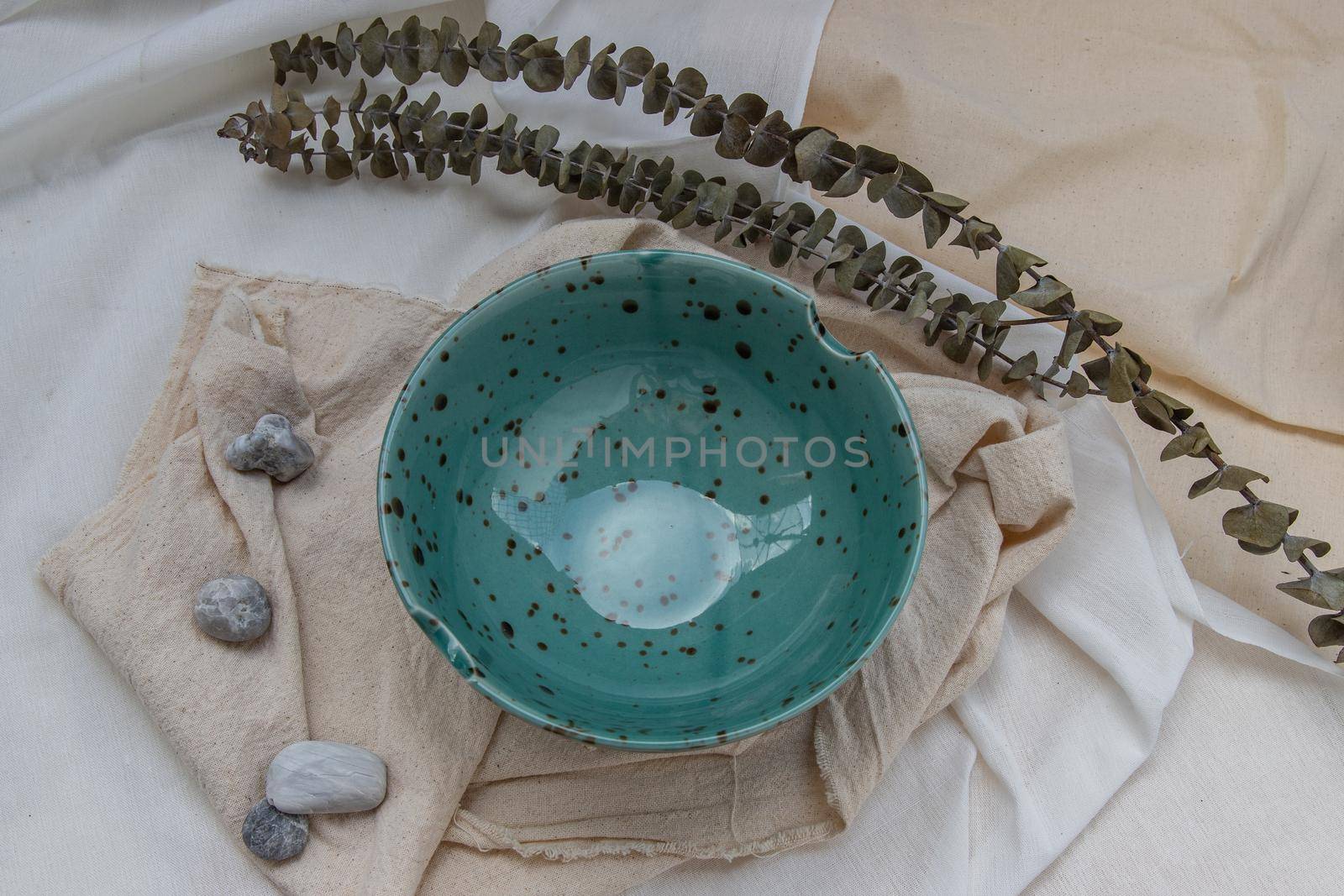 Ceramics bowl with Dried flowers on Calico. Beautiful arrangement.