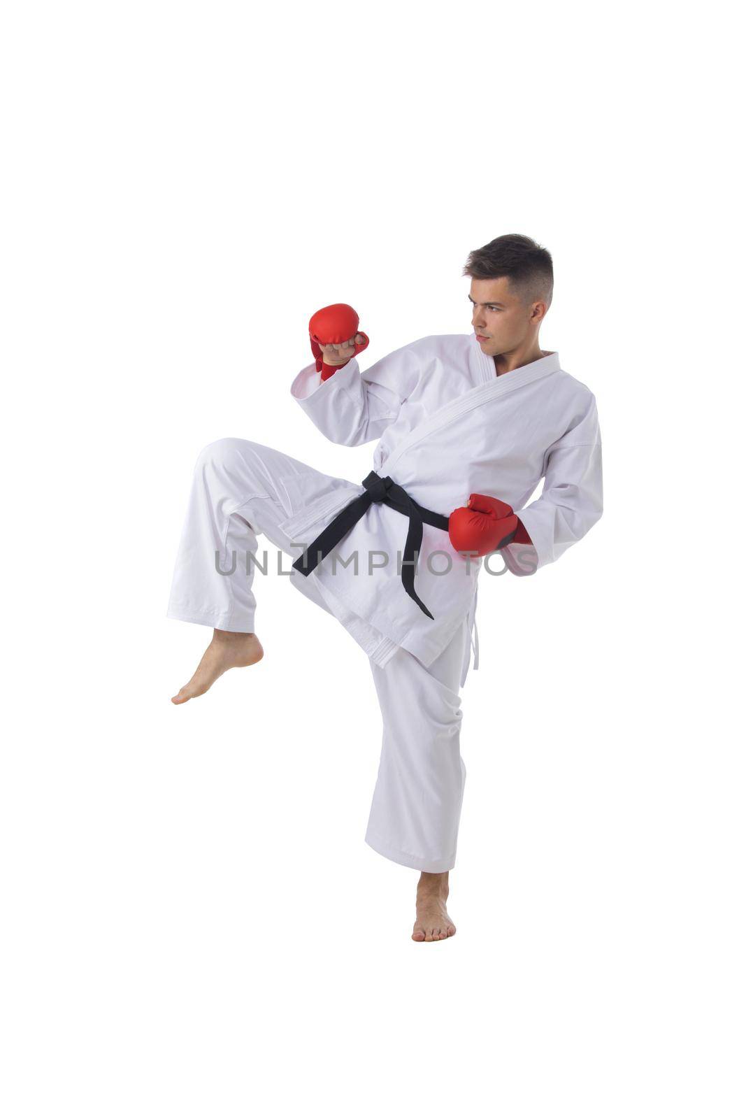 Man training taekwondo on white by ALotOfPeople