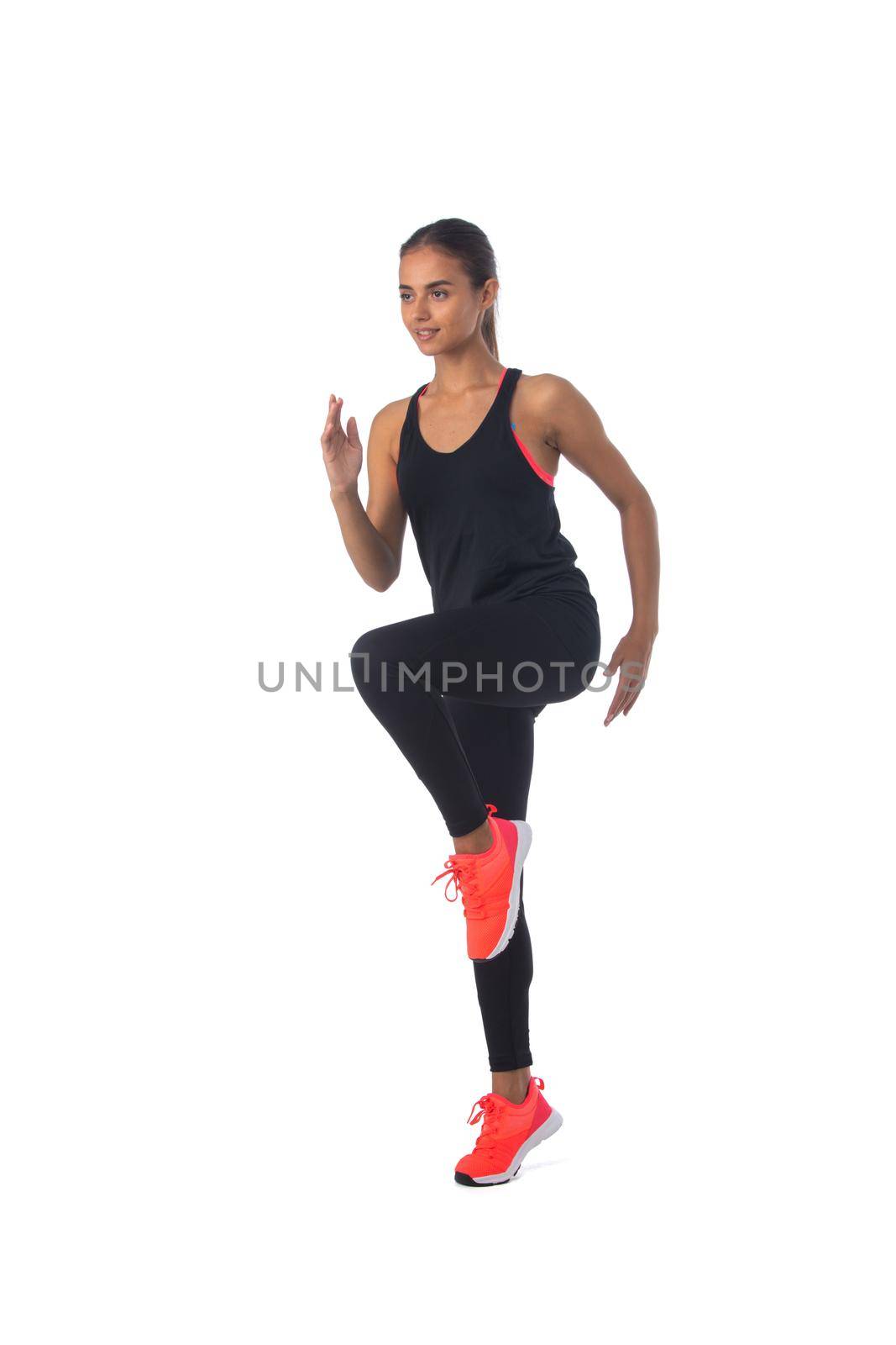 Healthy hispanic fitness girl with doing workout squat exercise isolated on white background
