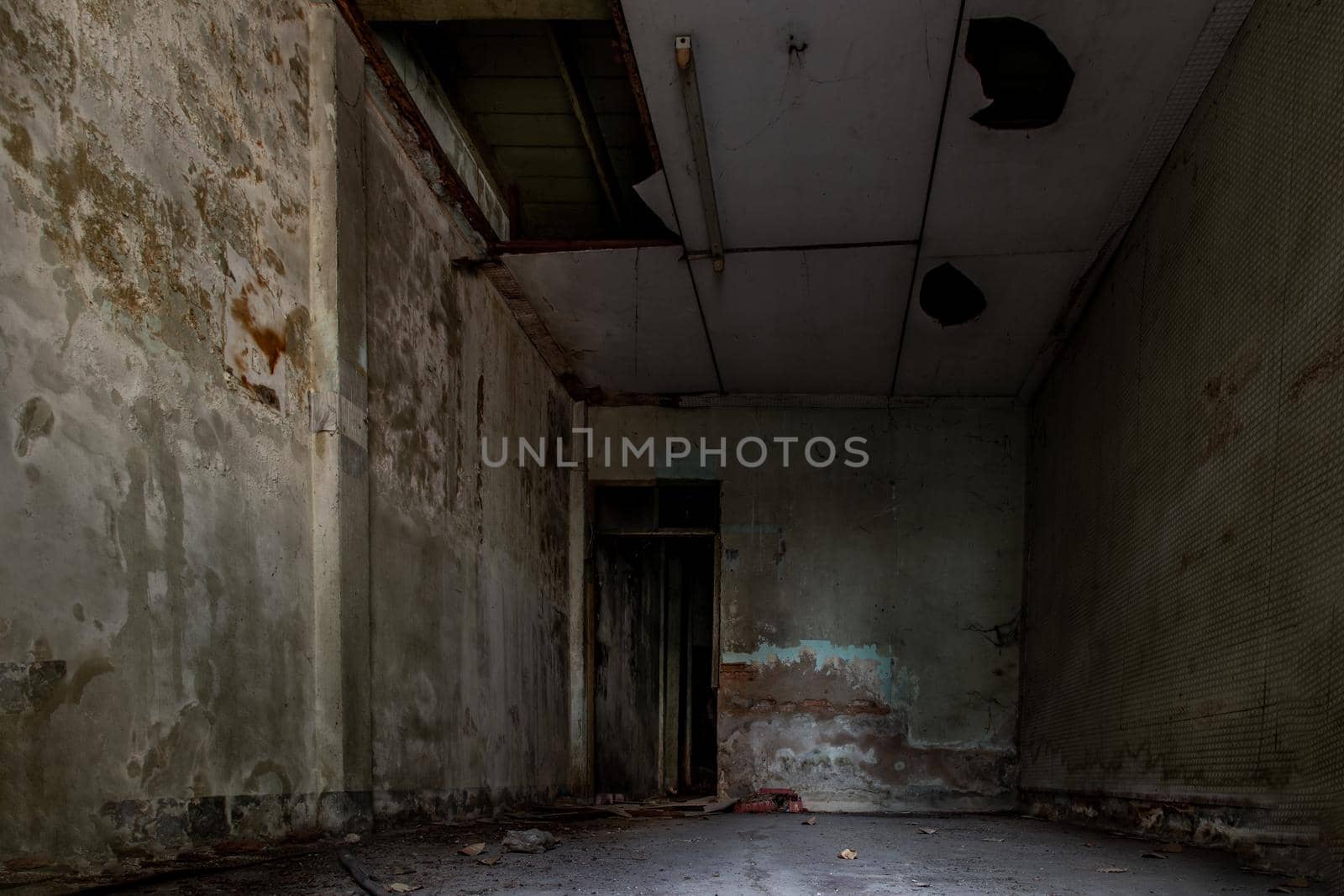 Bangkok, Thailand - Jan 19, 2020 : Old cement wall of Deteriorated abandoned old house, Destroyed house, Ruined house.