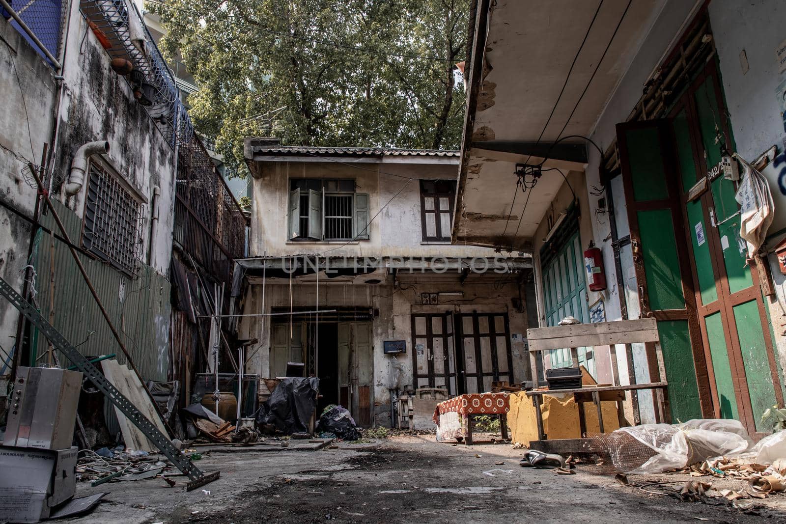 Bangkok, Thailand - Jan 19, 2020 : External of old house was left to deteriorate over time, Chinese Architecture style, Abandoned house, Destroyed house, Ruined house.