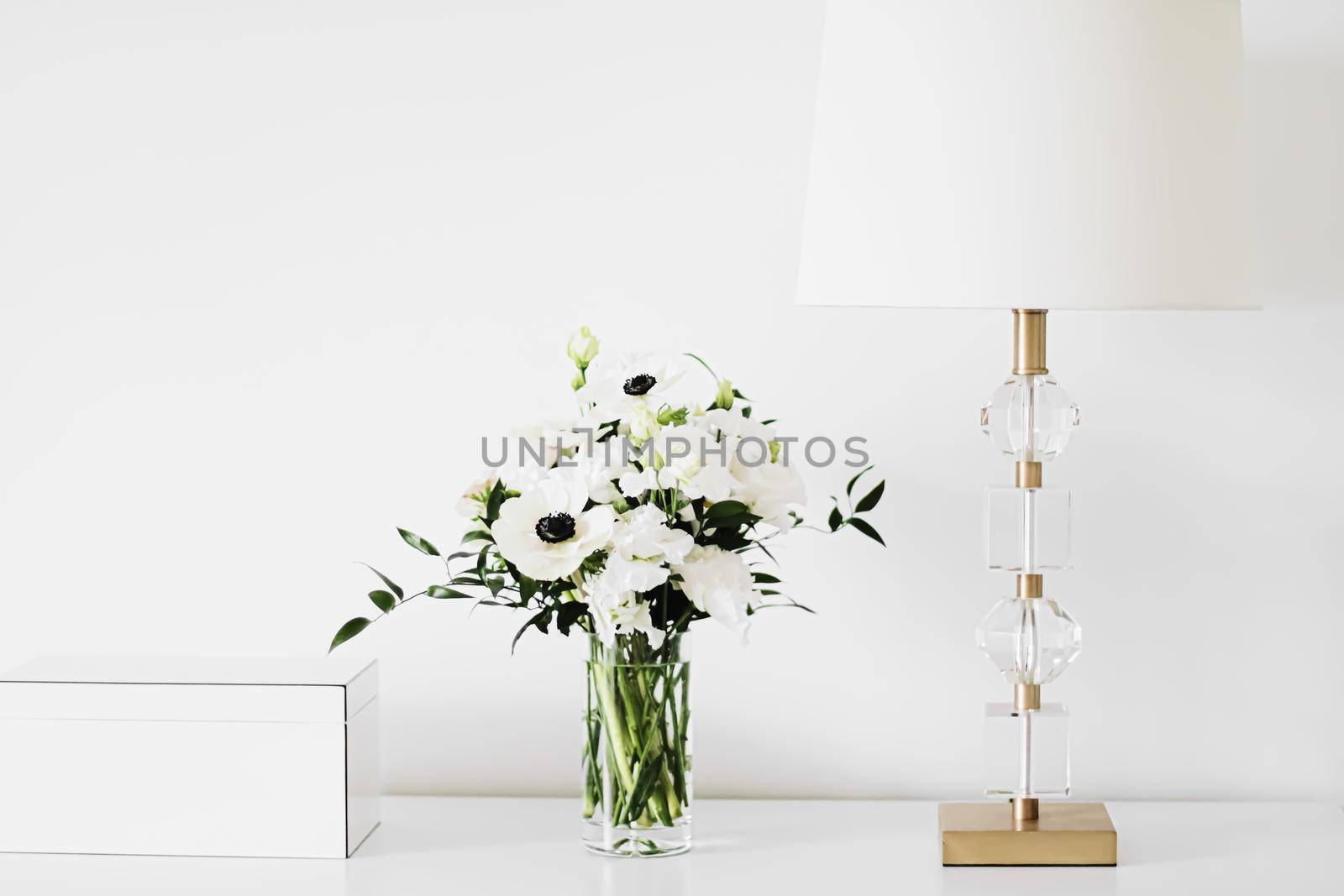 Bouquet of flowers in vase and home decor details, luxury interior design closeup