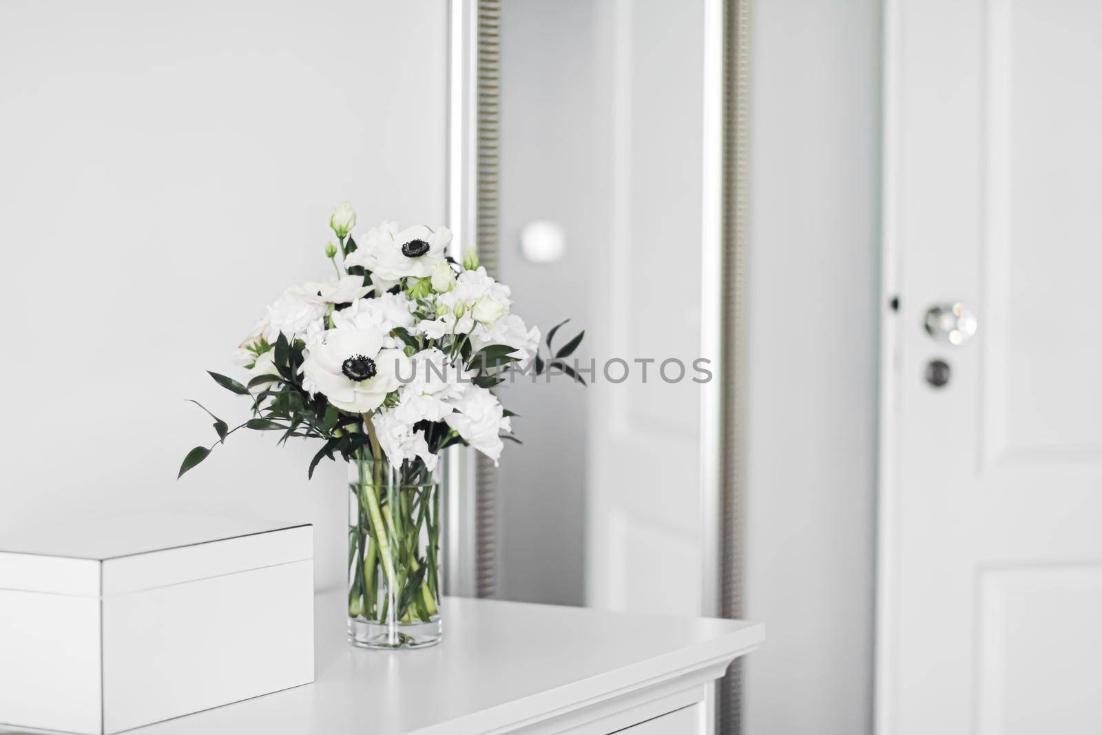 Bouquet of flowers in vase and home decor details, luxury interior design by Anneleven