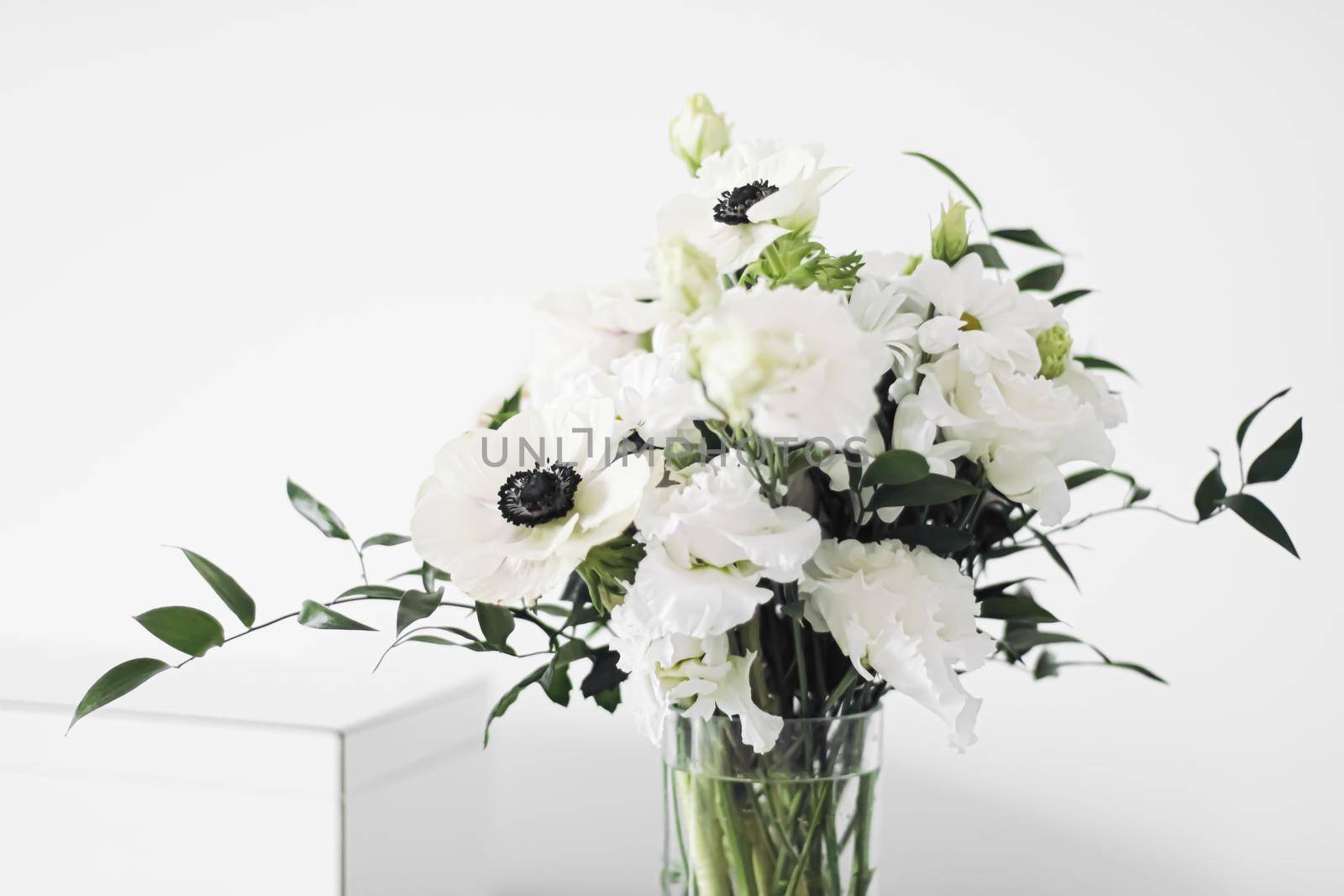 Bouquet of flowers in vase and home decor details, luxury interior design closeup