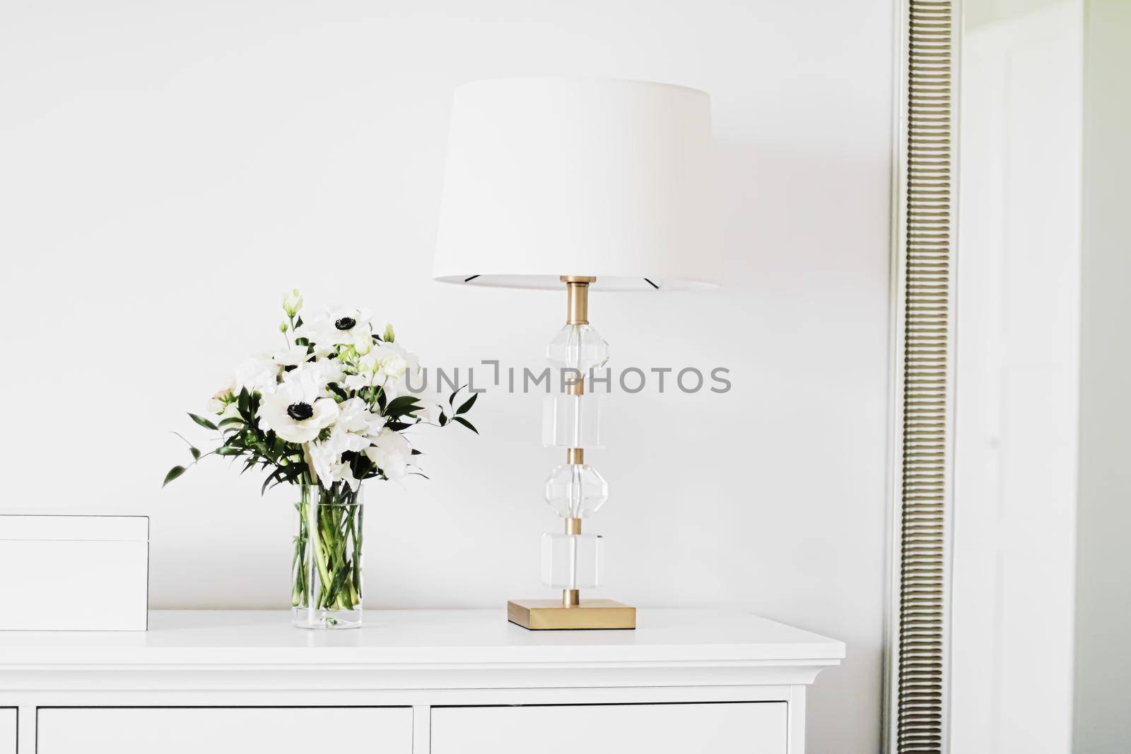 Bouquet of flowers in vase and home decor details, luxury interior design by Anneleven