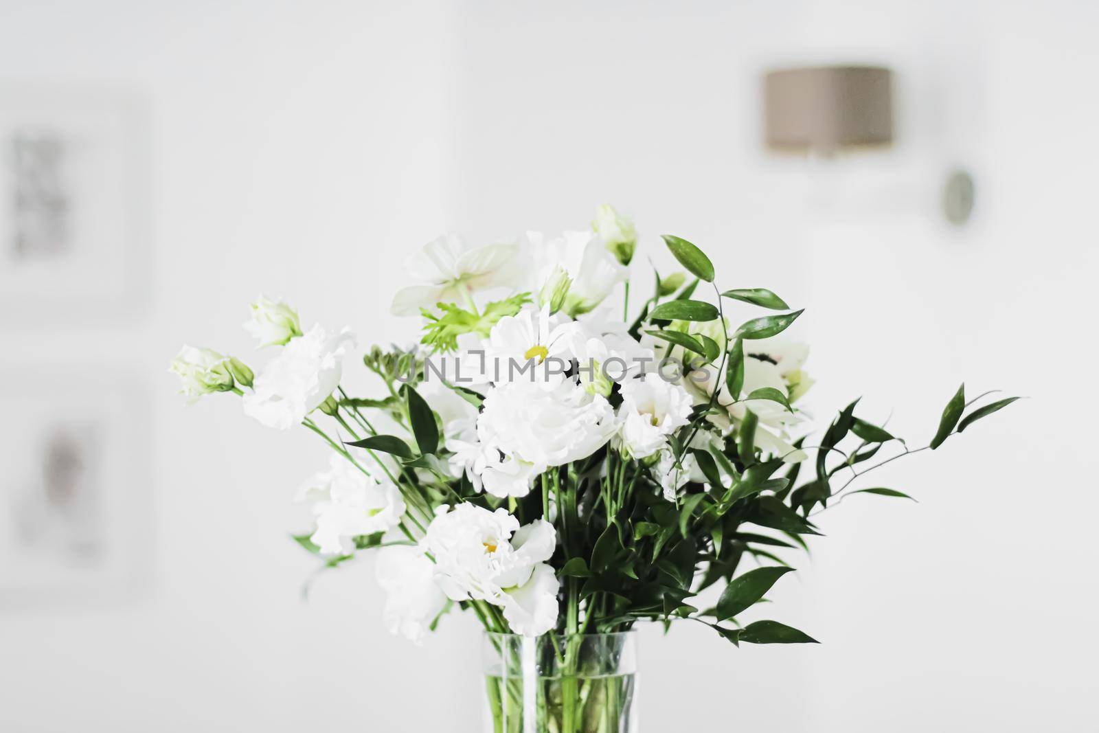 Bouquet of flowers in vase and home decor details, luxury interior design by Anneleven