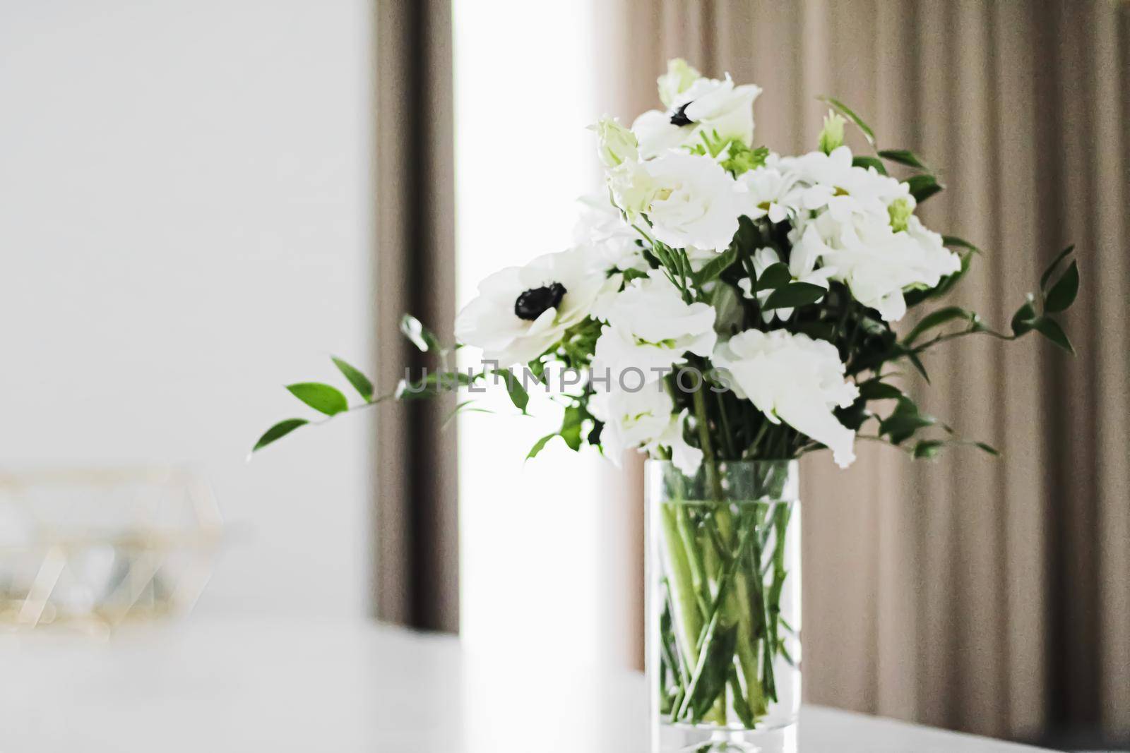 Bouquet of flowers in vase and home decor details, luxury interior design by Anneleven