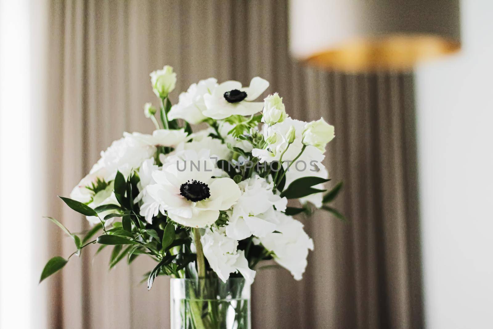 Bouquet of flowers in vase and home decor details, luxury interior design closeup