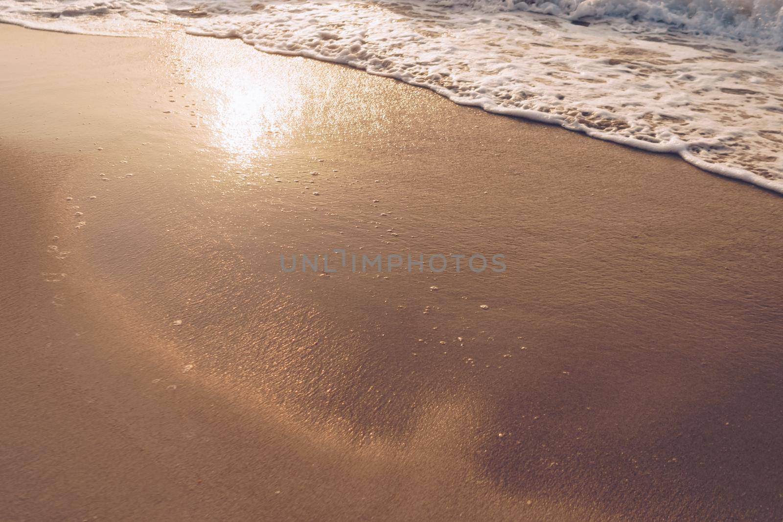 Top view of sand and sea water splash with copy space at tropical clean summer. by Suwant