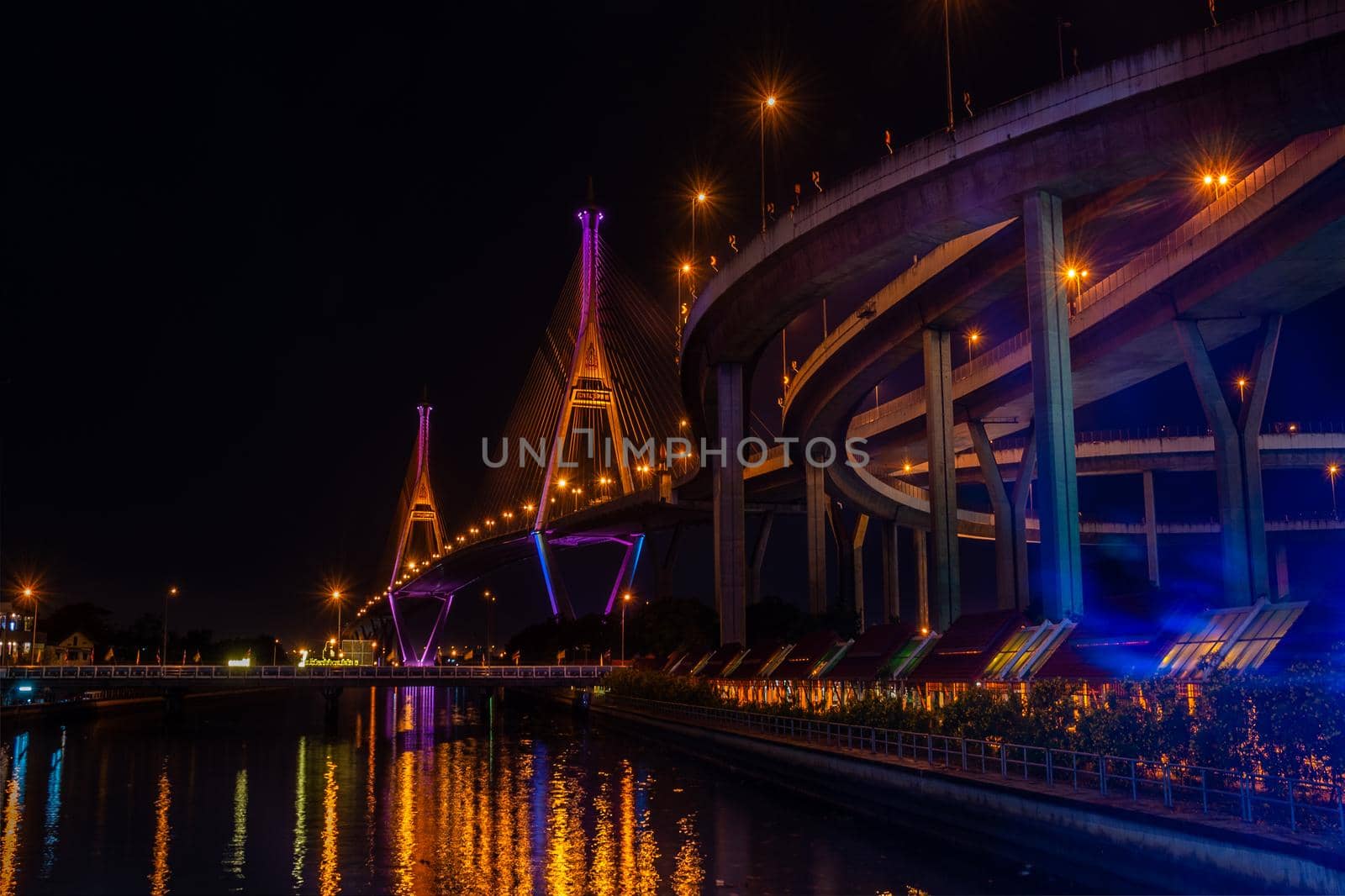 Samutprakan, thailand -  jun, 2019 : Twilight scenes of The Bhumibol Bridge,also known as the Industrial Ring Road Bridge is part of the 13 km . The bridge crosses the Chao Phraya River twice.