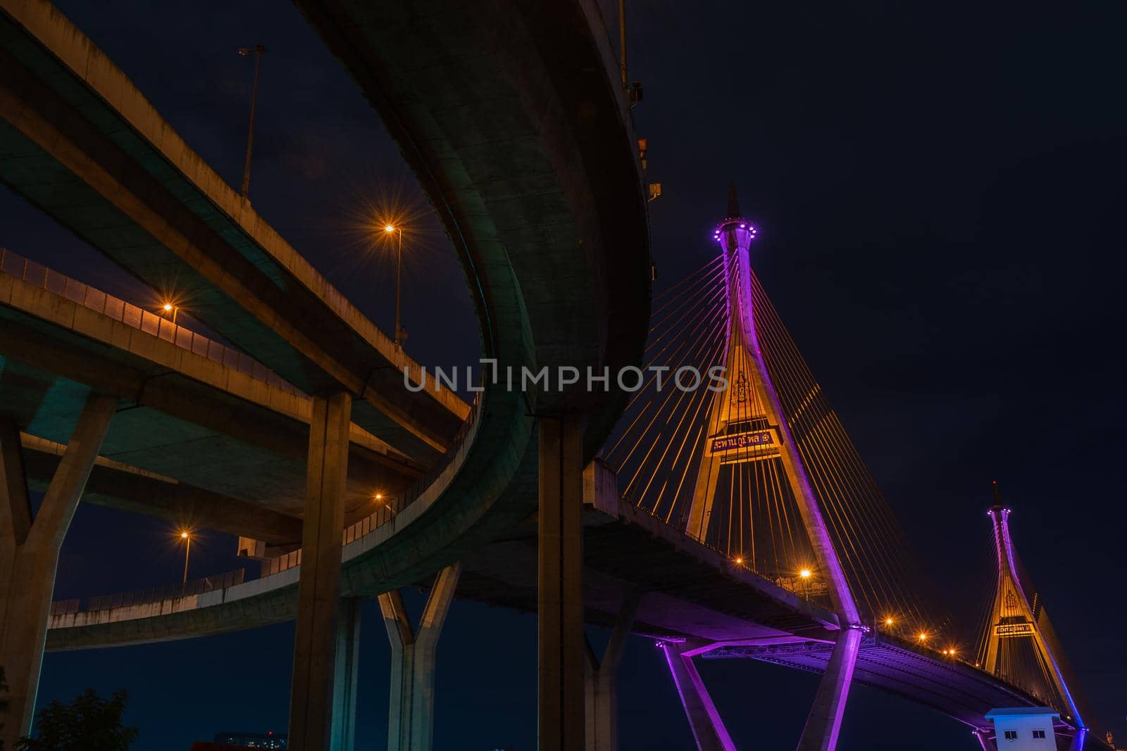 Samutprakan, thailand -  jun, 2019 : Twilight scenes of The Bhumibol Bridge,also known as the Industrial Ring Road Bridge is part of the 13 km . The bridge crosses the Chao Phraya River twice.