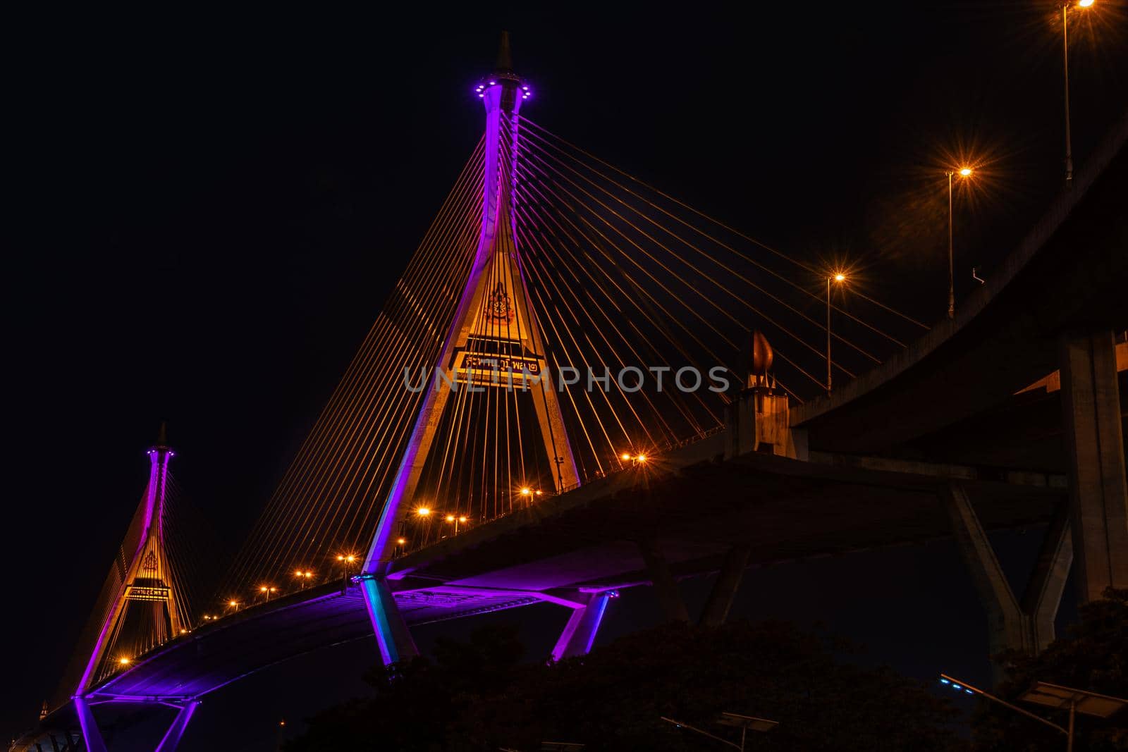 Samutprakan, thailand -  jun, 2019 : Twilight scenes of The Bhumibol Bridge,also known as the Industrial Ring Road Bridge is part of the 13 km . The bridge crosses the Chao Phraya River twice.