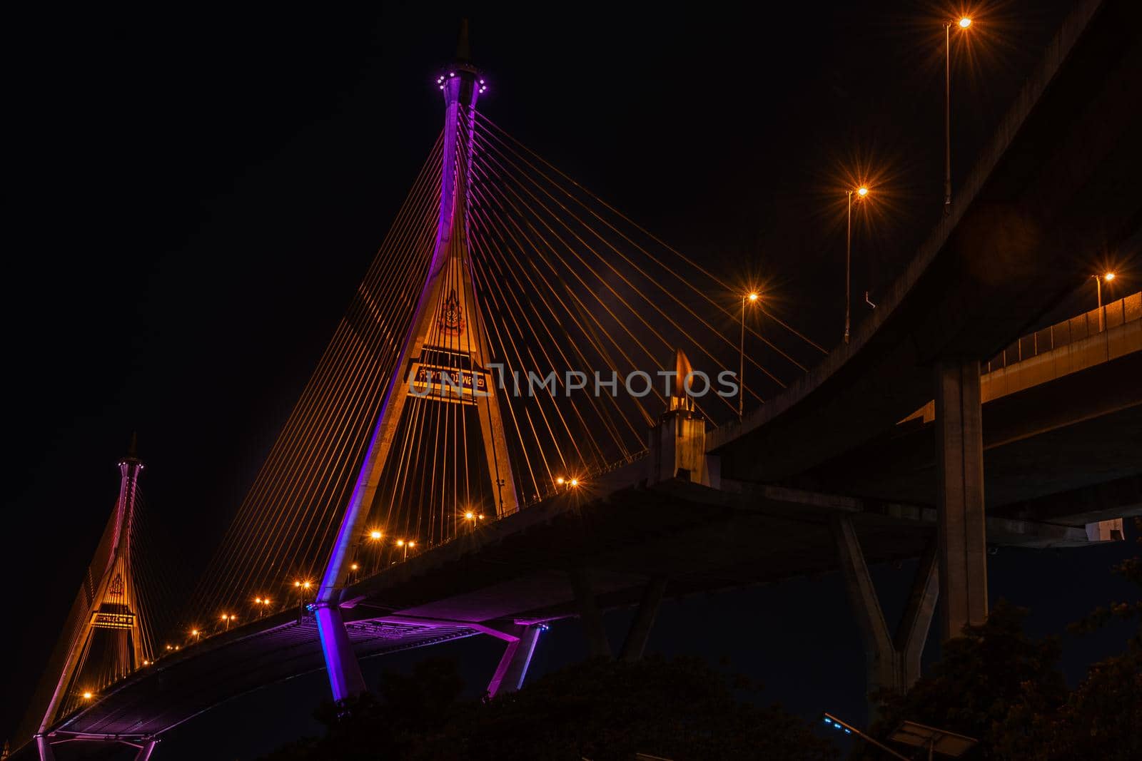 Samutprakan, thailand -  jun, 2019 : Twilight scenes of The Bhumibol Bridge,also known as the Industrial Ring Road Bridge is part of the 13 km . The bridge crosses the Chao Phraya River twice.