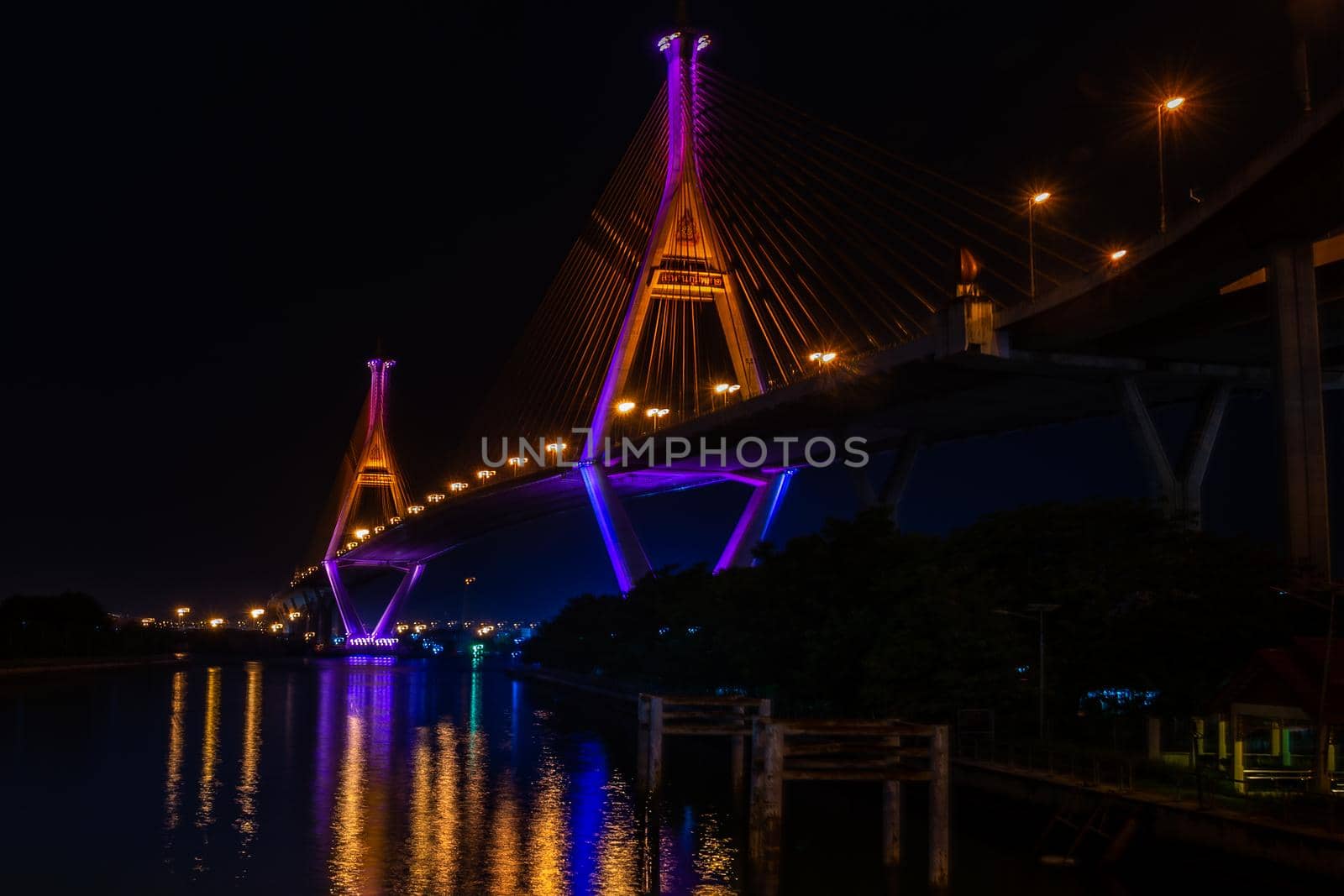 Samutprakan, thailand -  jun, 2019 : Twilight scenes of The Bhumibol Bridge,also known as the Industrial Ring Road Bridge is part of the 13 km . The bridge crosses the Chao Phraya River twice.