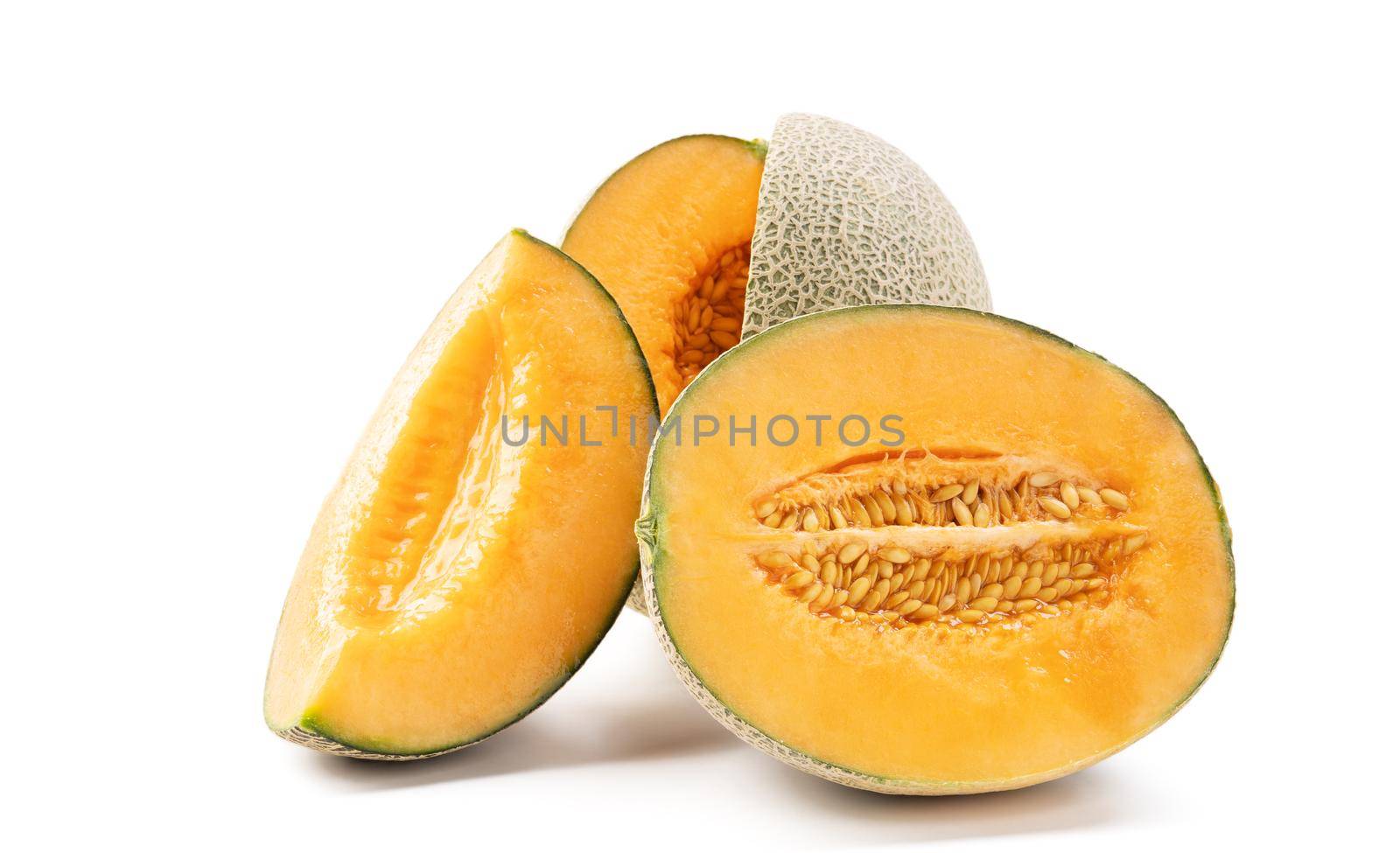 Close up of beautiful tasty sliced juicy cantaloupe melon, muskmelon, rock melon isolated on white background.