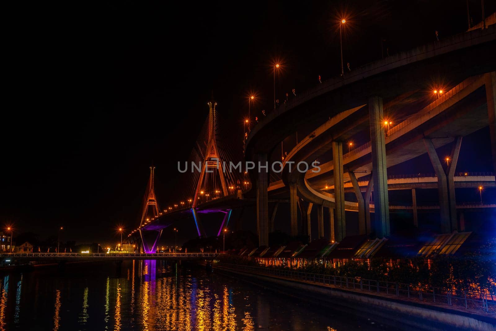 Samutprakan, thailand -  jun, 2019 : Twilight scenes of The Bhumibol Bridge,also known as the Industrial Ring Road Bridge is part of the 13 km . The bridge crosses the Chao Phraya River twice.