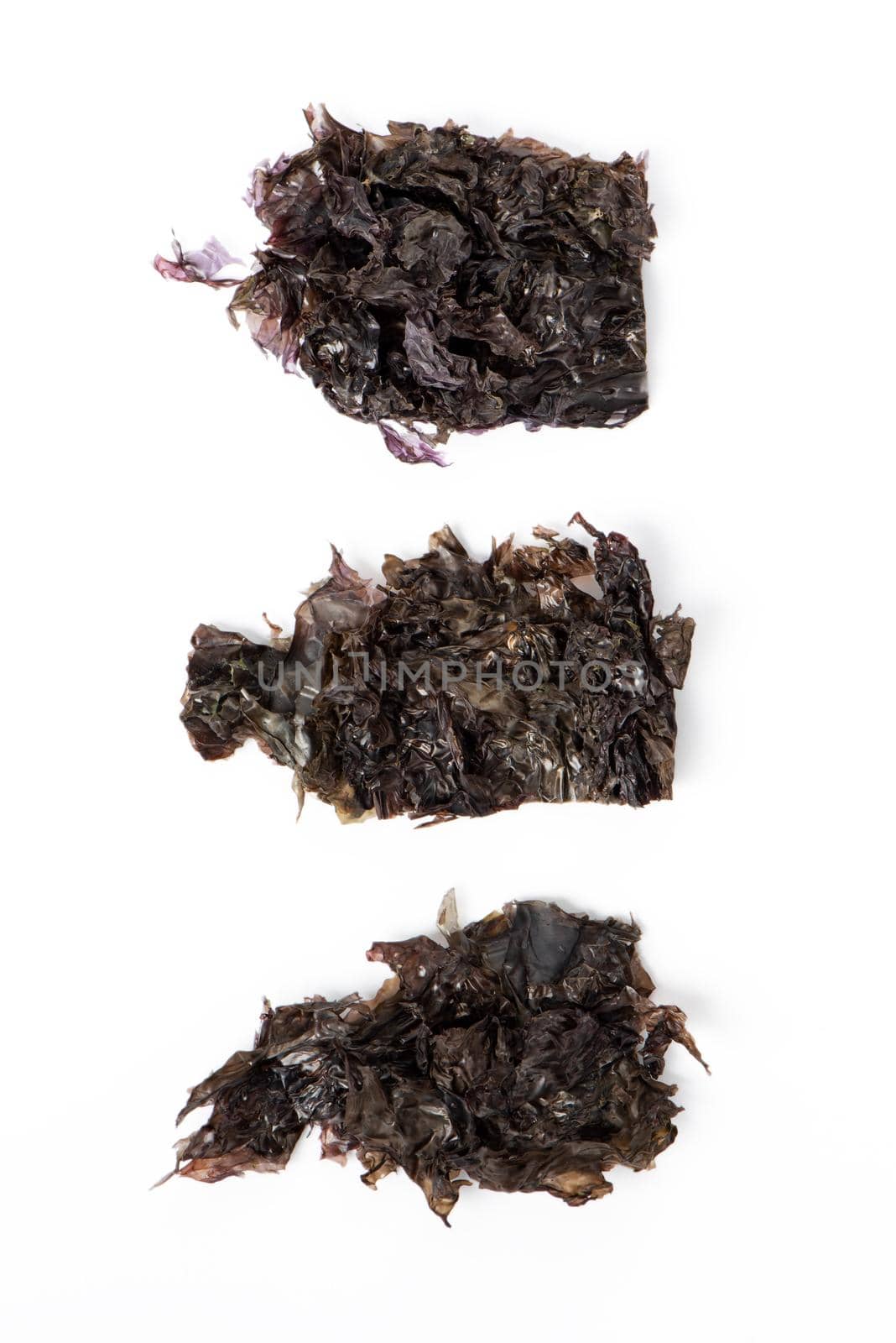 Close up of dried seaweed sheet healthy food isolated on white table background