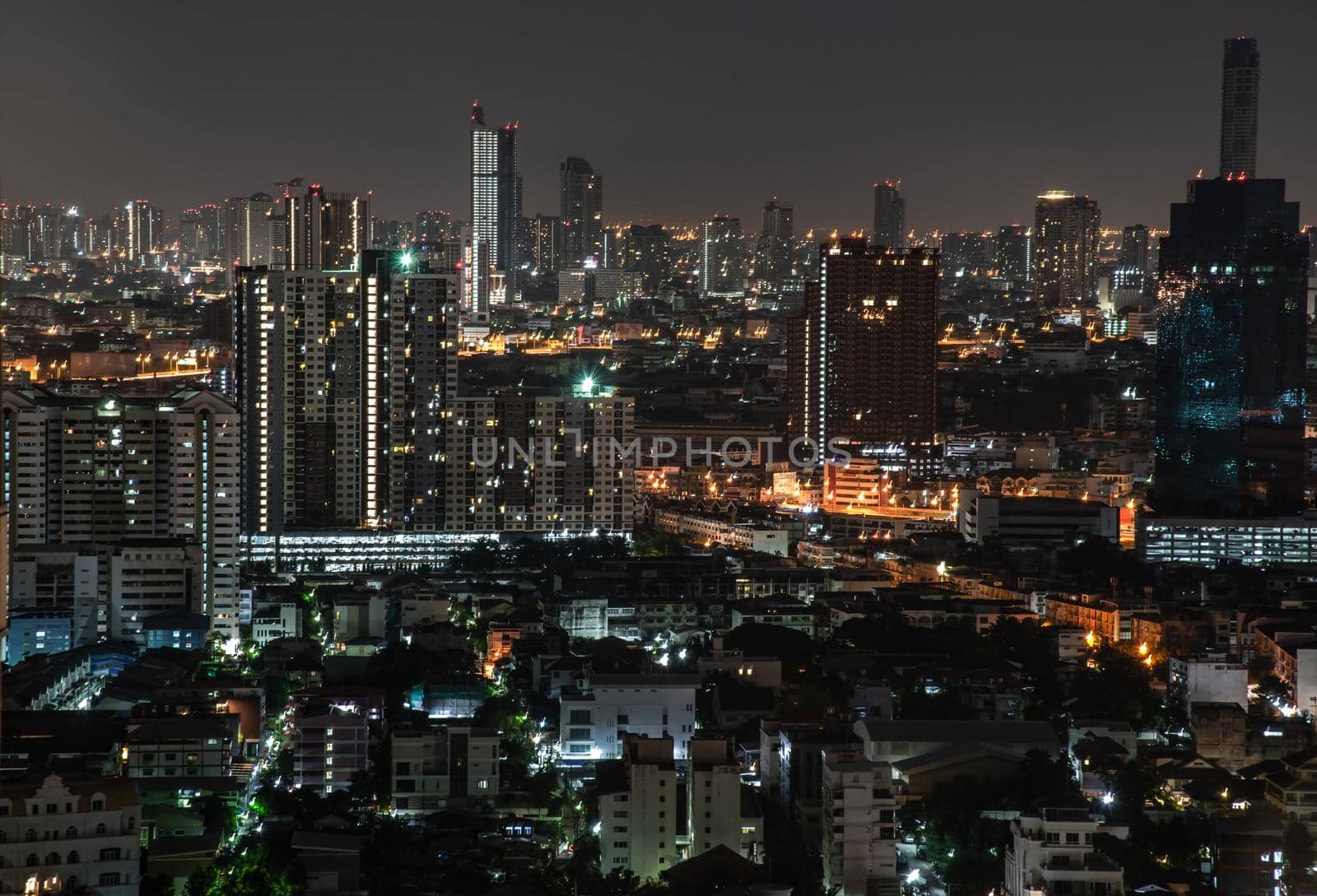 Bangkok, thailand - Oct 18, 2019 : Sky view of Bangkok with skyscrapers in the business district in Bangkok In the night beautiful twilight give the city a modern style.