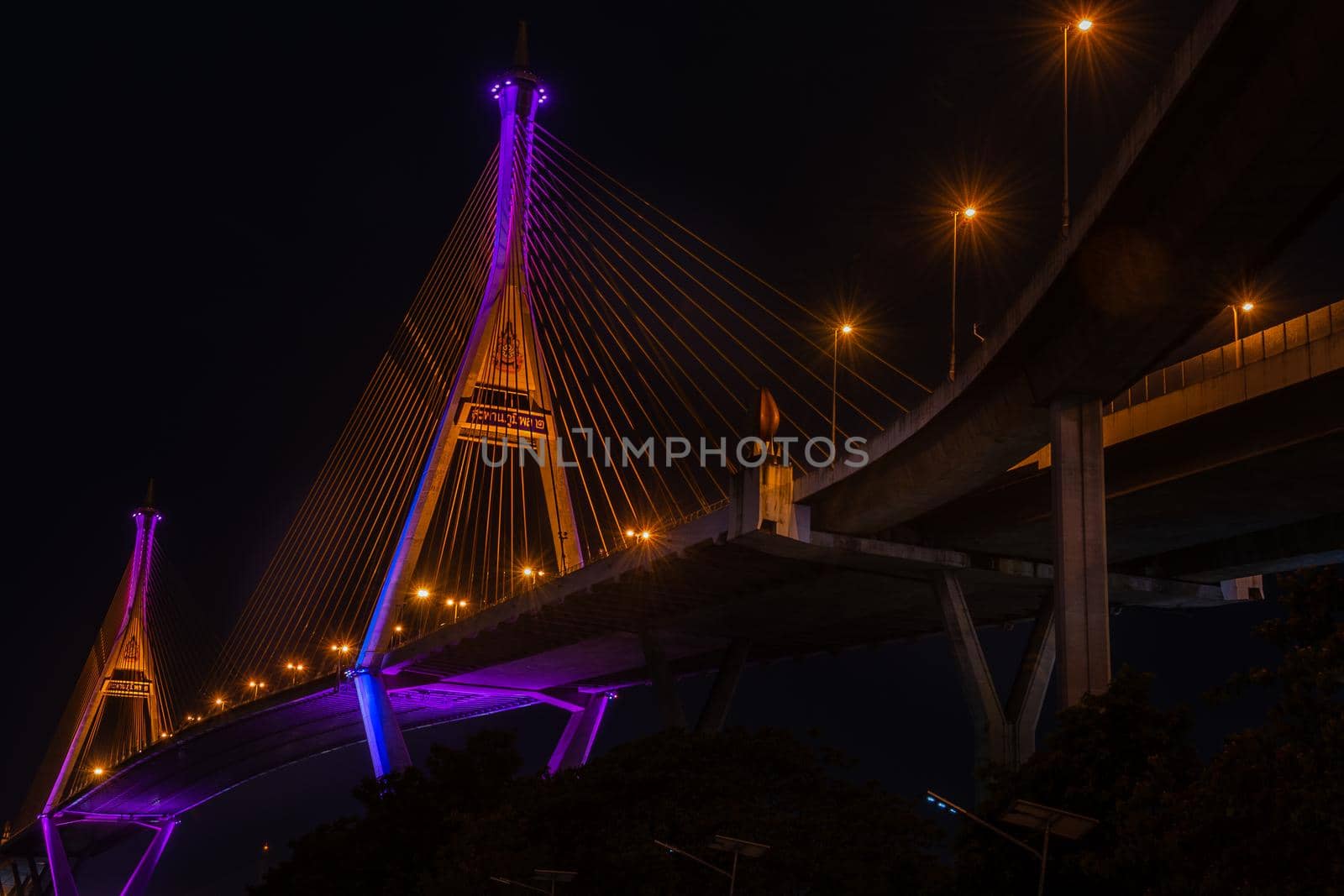 Samutprakan, thailand -  jun, 2019 : Twilight scenes of The Bhumibol Bridge,also known as the Industrial Ring Road Bridge is part of the 13 km . The bridge crosses the Chao Phraya River twice.