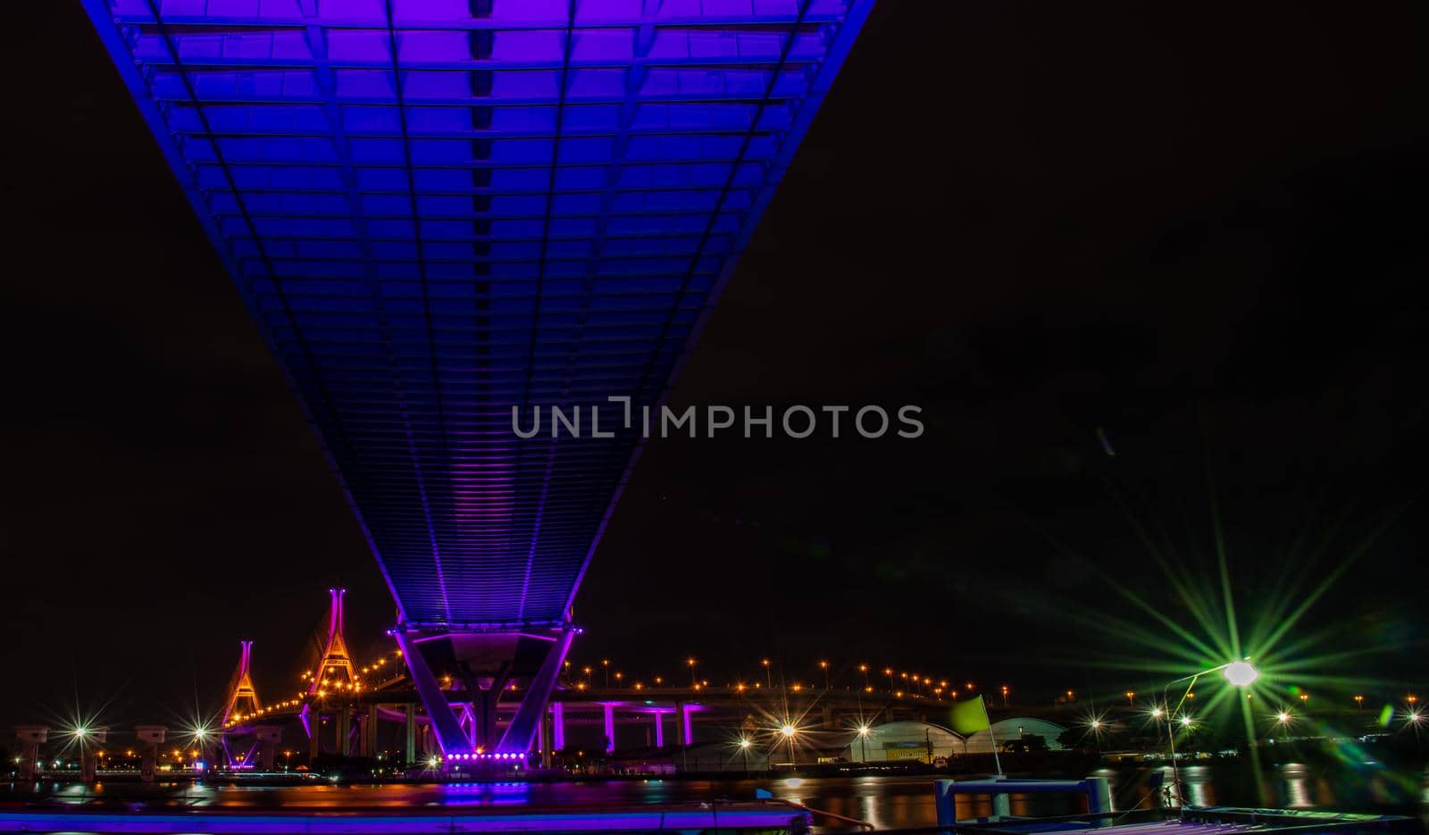 Bangkok, thailand -27 Oct, 2019 : Twilight scenes of The Bhumibol Bridge,also known as the Industrial Ring Road Bridge is part of the 13 km . The bridge crosses the Chao Phraya River twice.