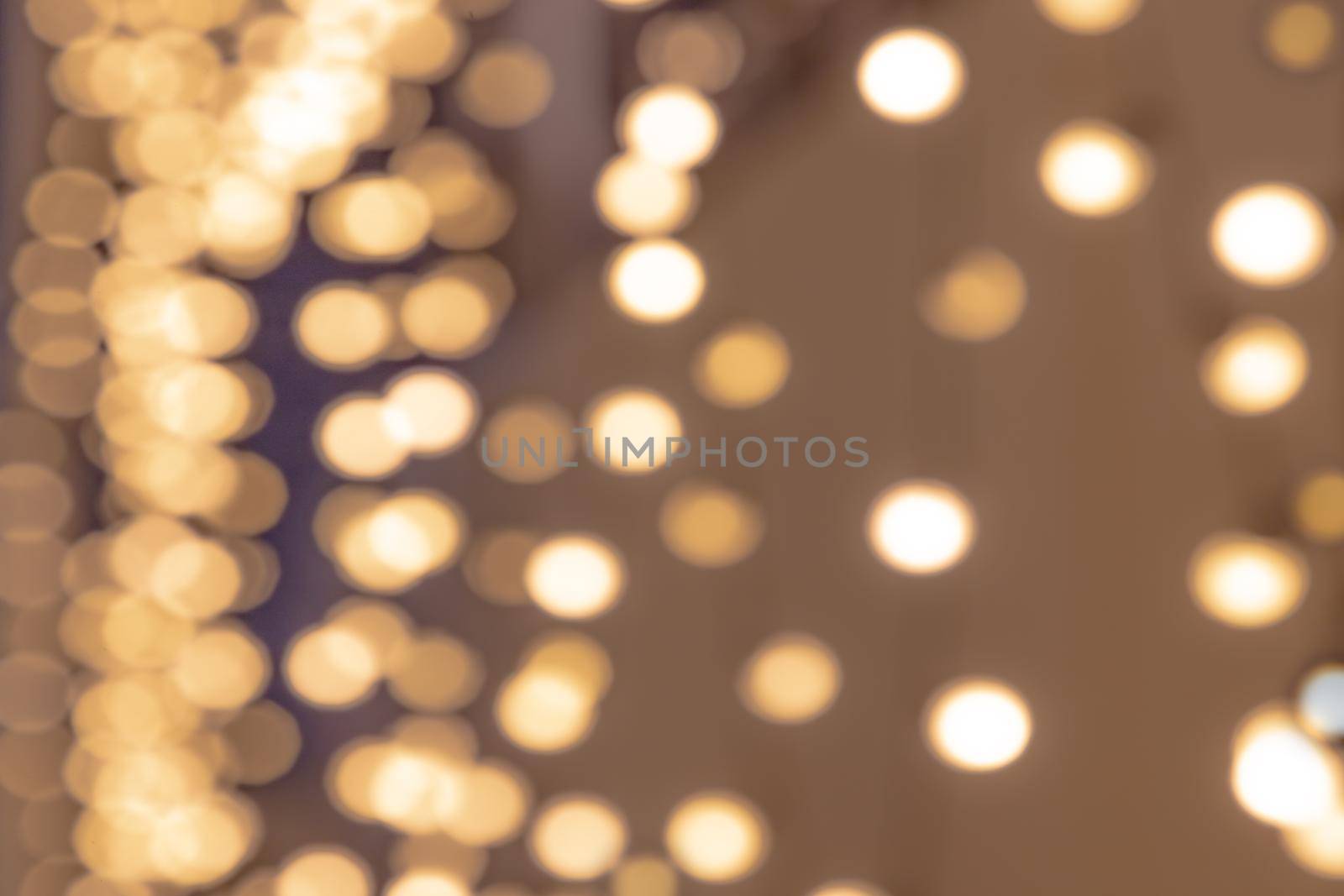 Festive colorful bokeh background with psychedelic colorful sparkles and colorful dots as perfect background, celebration and happy new year annotations as beautiful blurred glow.