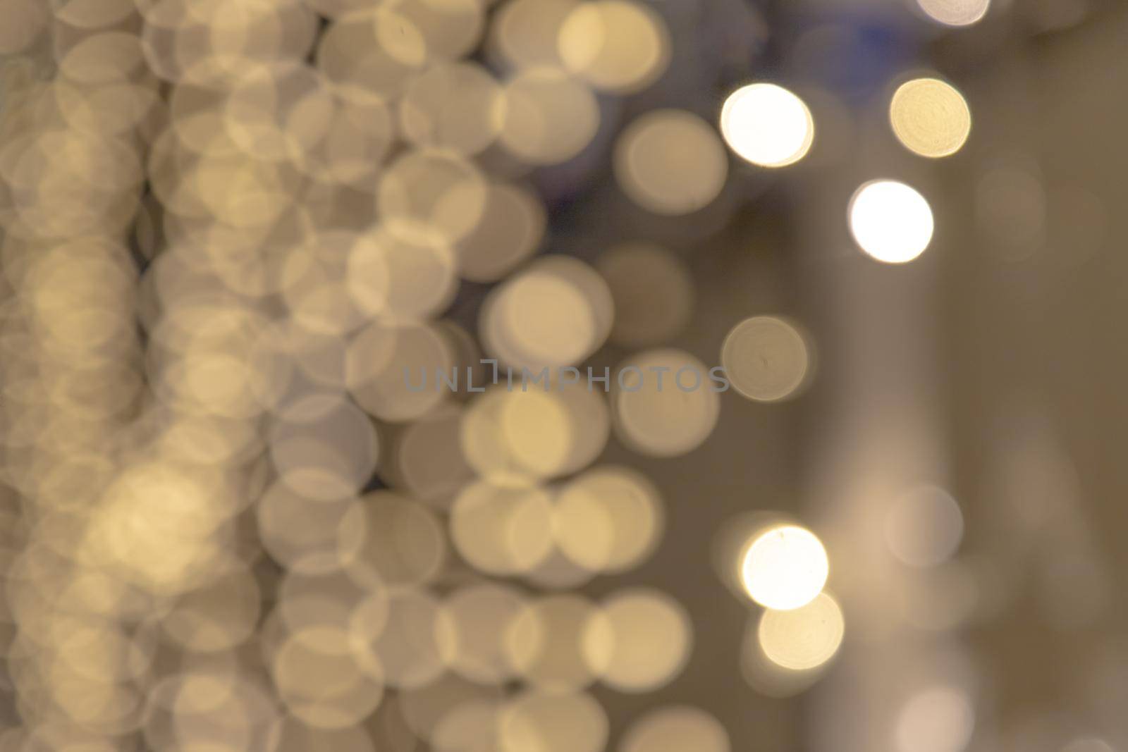 Festive colorful bokeh background with psychedelic colorful sparkles and colorful dots as perfect background, celebration and happy new year annotations as beautiful blurred glow.