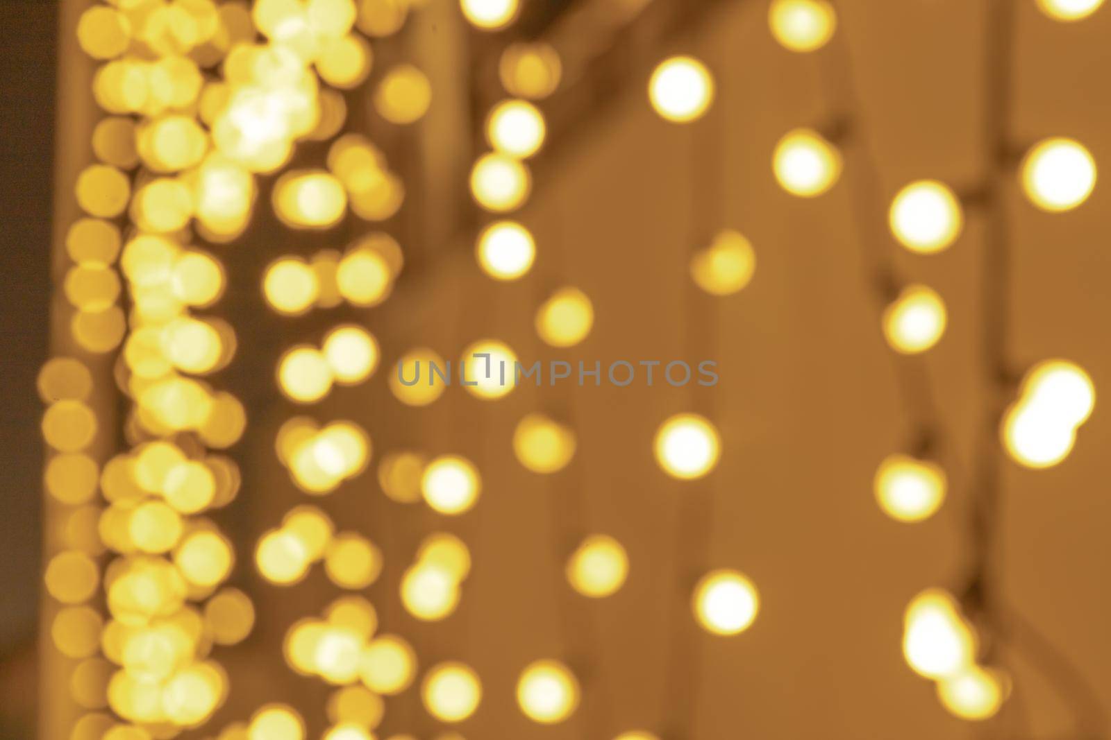 Festive colorful bokeh background with psychedelic colorful sparkles and colorful dots as perfect background, celebration and happy new year annotations as beautiful blurred glow.