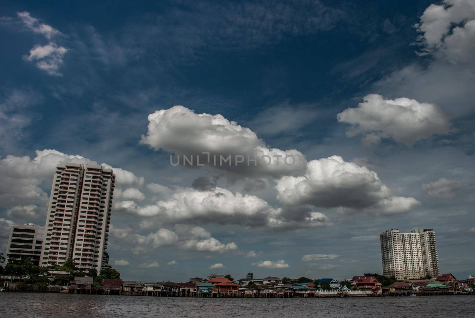 Bangkok, Thailand - 21 Jul 2019 : Bangkok skyscrapers along the Chao phraya make it a beautiful city, cloudy day.