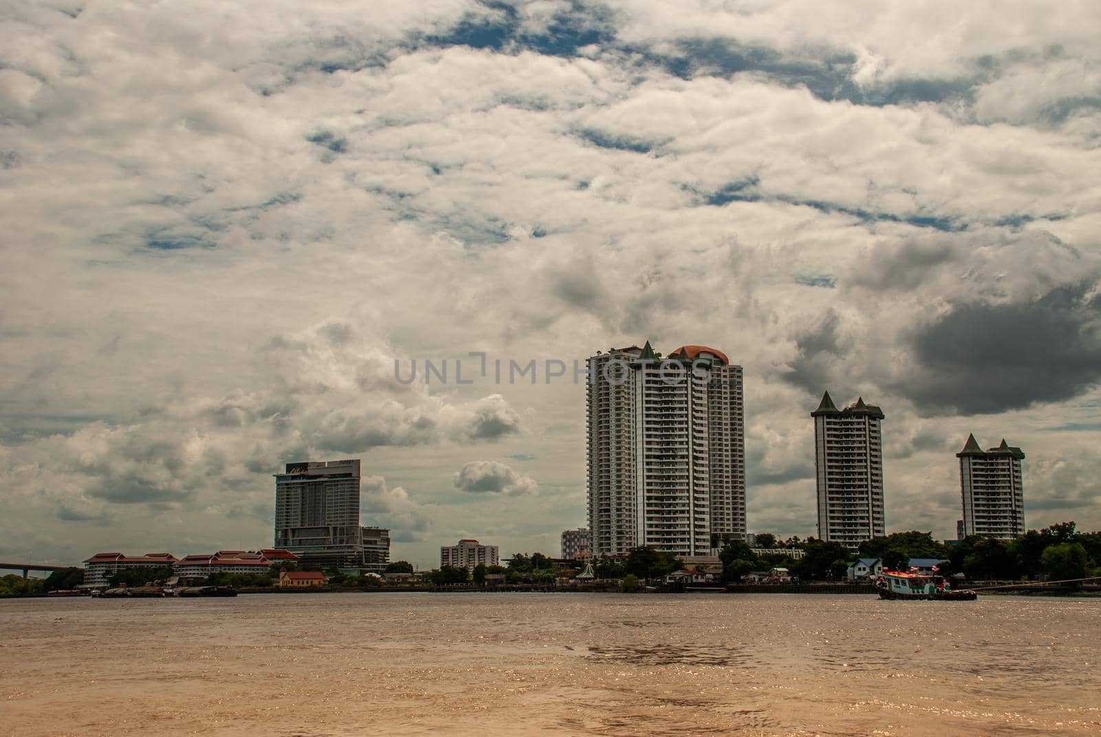 Bangkok, Thailand - 21 Jul 2019: Bangkok skyscrapers along the Chao phraya make it a beautiful city.