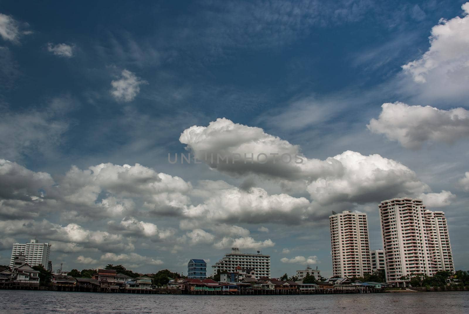 Bangkok, Thailand - 21 Jul 2019 : Bangkok skyscrapers along the Chao phraya make it a beautiful city, cloudy day.