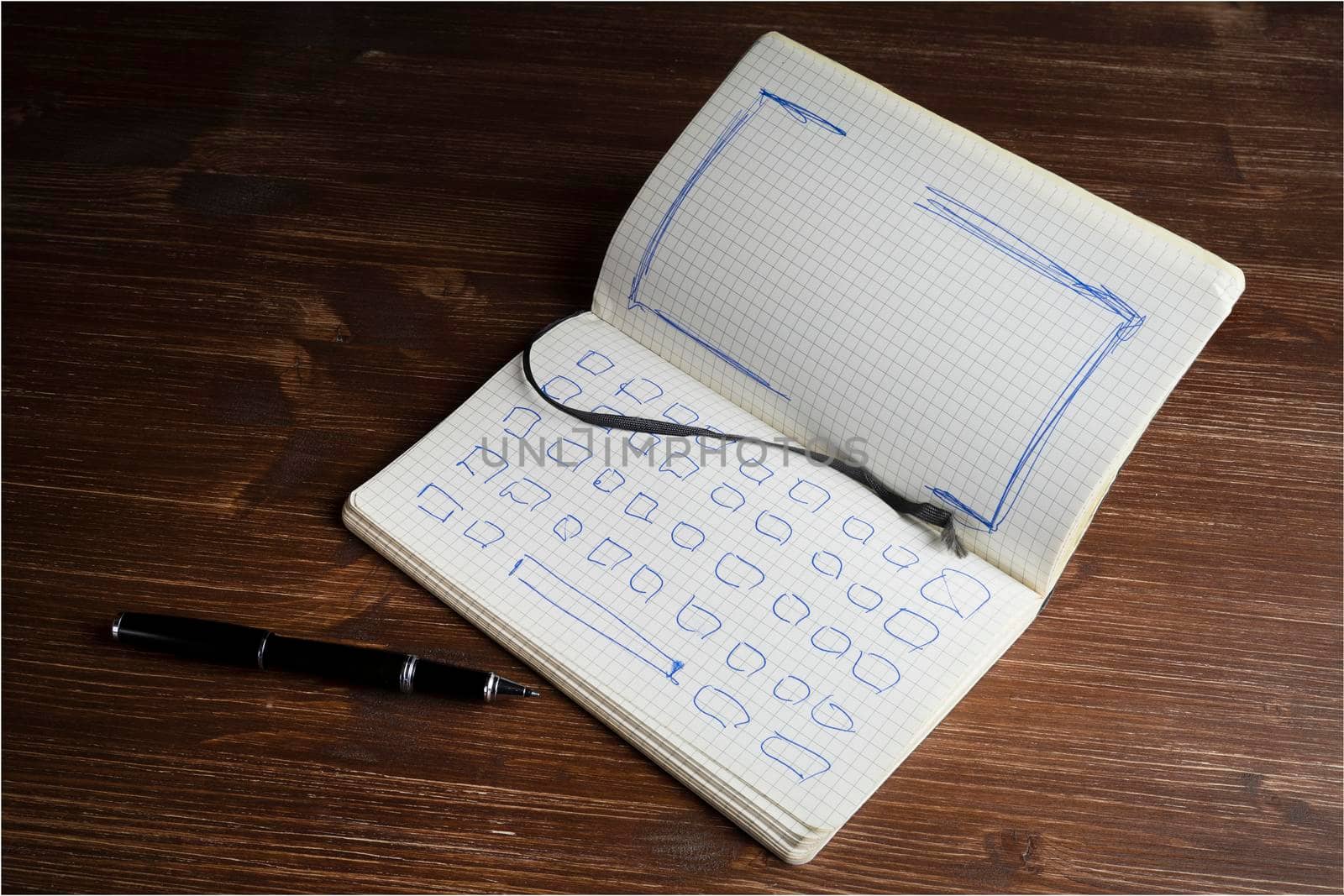 a notebook with the drawing of the keyboard and the screen of a notebook