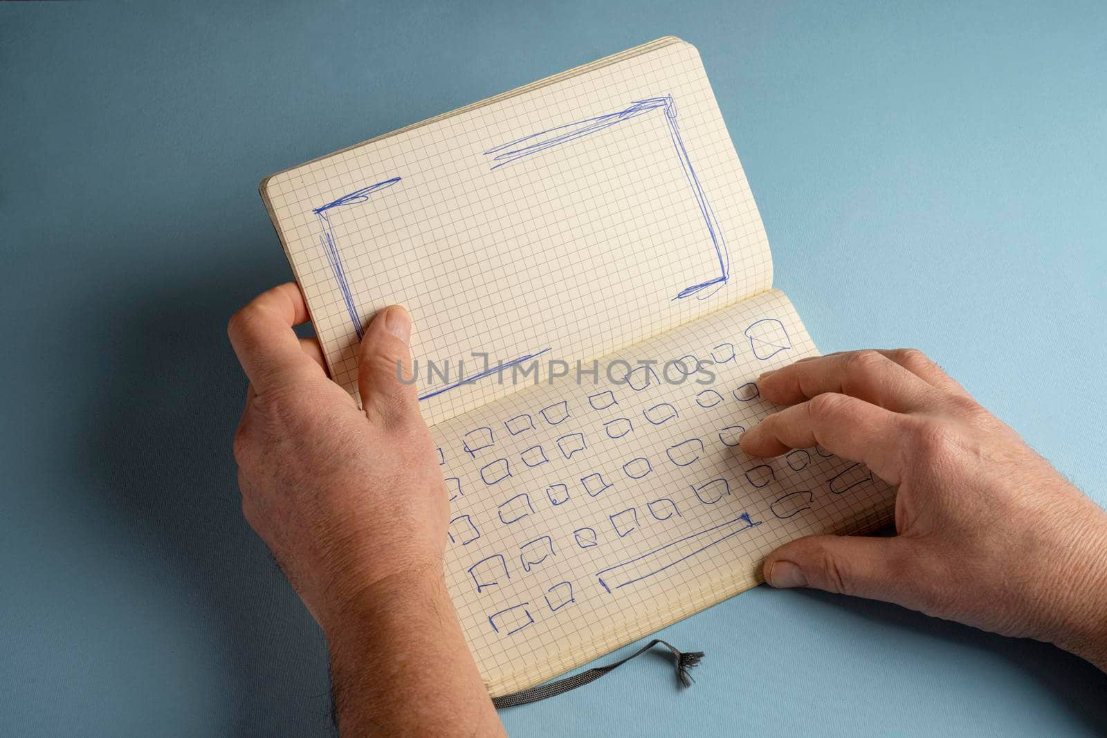 a notebook with the drawing of the keyboard and the screen of a notebook