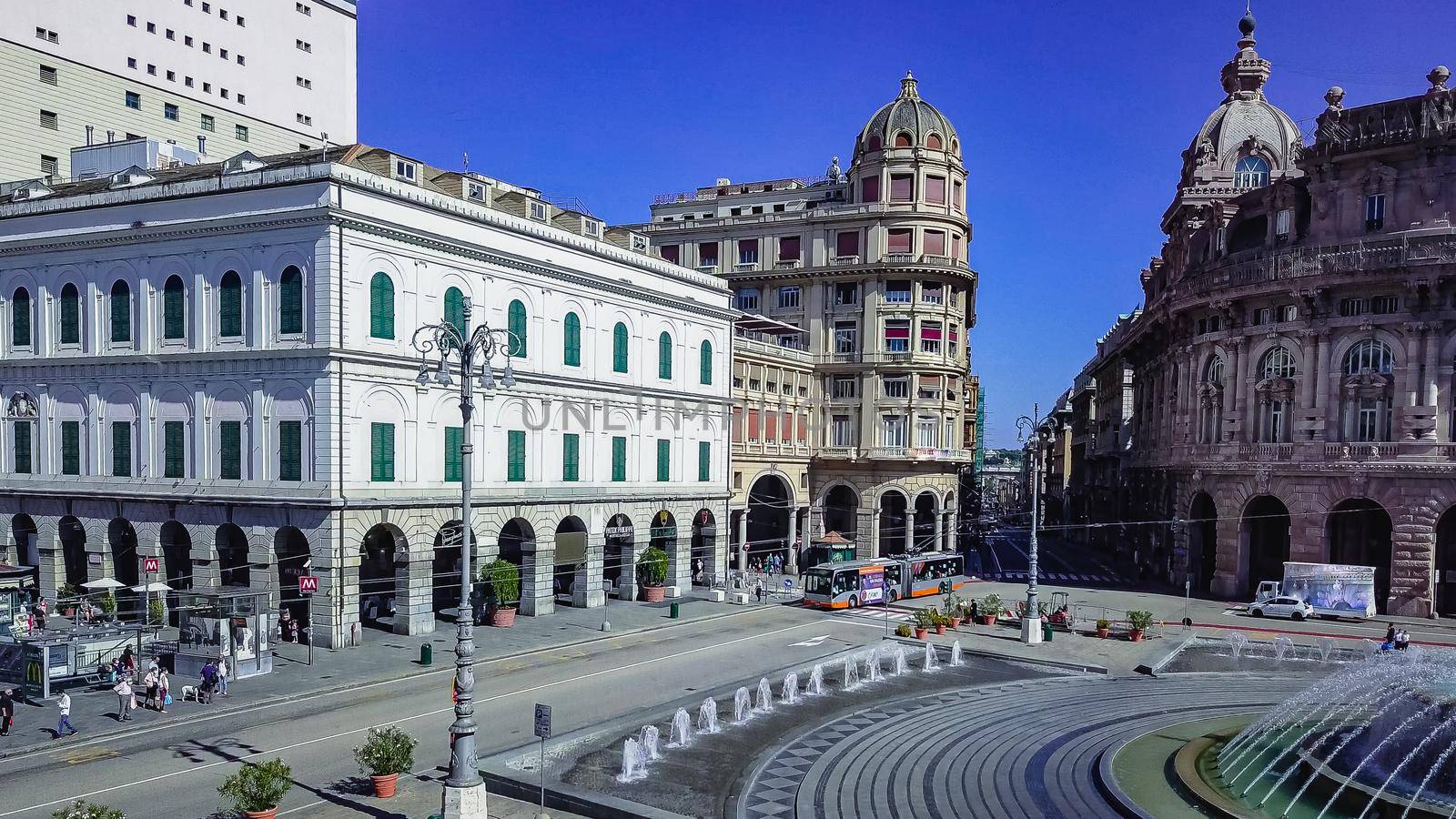 Aerial panoramic drone view of De Ferrari square in Genoa,Italy. Situated in the heart of the city between the historical and the modern center. In the background the Ducal Palace.