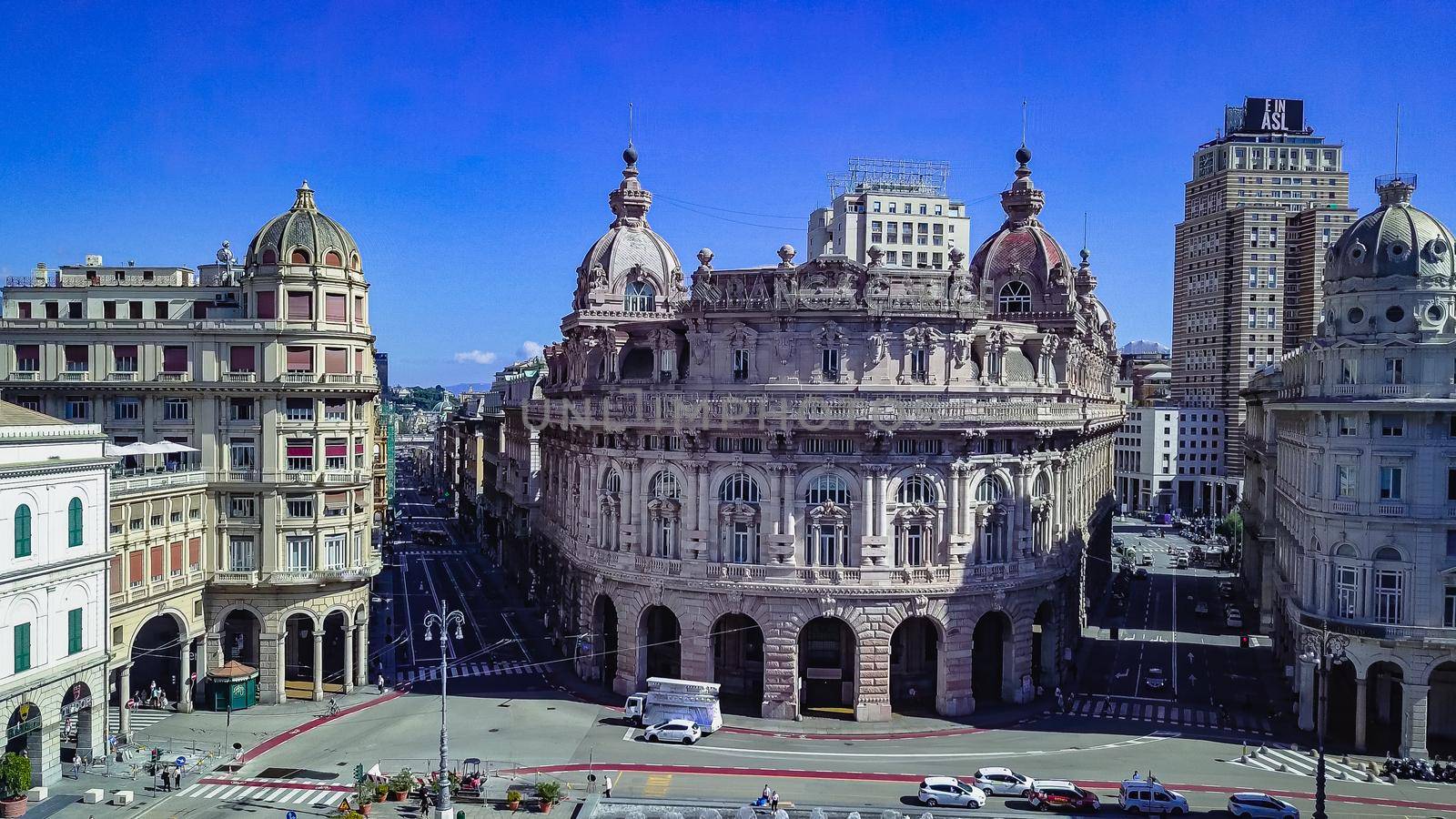 Aerial panoramic drone view of De Ferrari square in Genoa,Italy. Situated in the heart of the city between the historical and the modern center. In the background the Palazzo della Borsa.