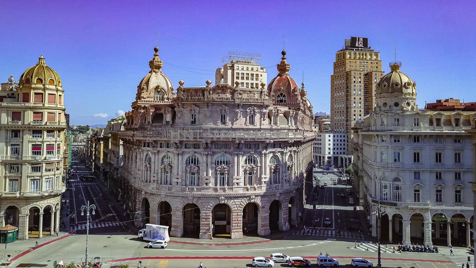 Aerial panoramic drone view of De Ferrari square in Genoa,Italy. Situated in the heart of the city between the historical and the modern center. In the background the Palazzo della Borsa.