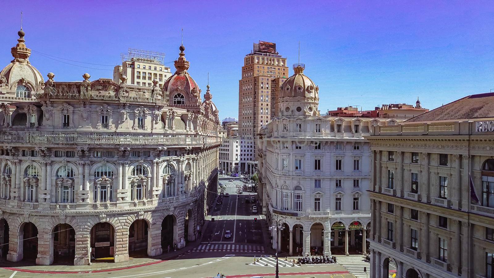 Aerial panoramic drone view of De Ferrari square in Genoa,Italy. Situated in the heart of the city between the historical and the modern center. In the background the Palazzo della Borsa.