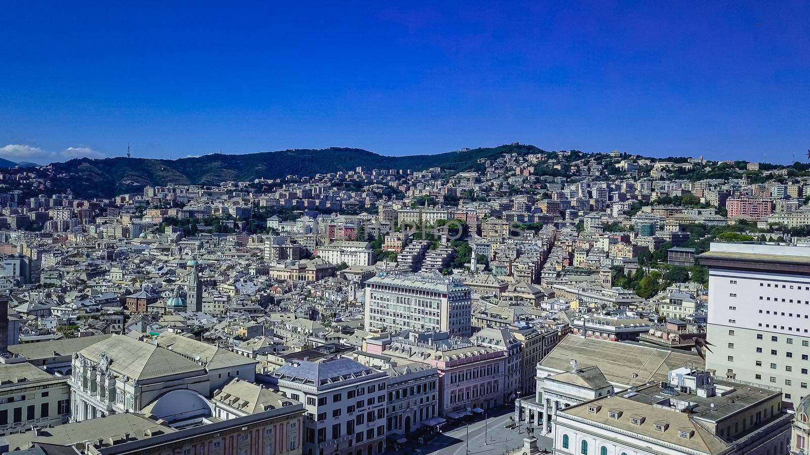 Genoa, Italy. Central part of the city, panoramic drone aerial view.Buildings and Streets surrounding modern centre quarter, Liguria.