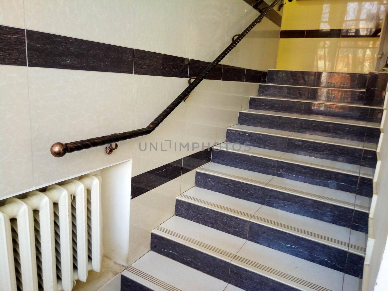 Stairs, railings and steps in a modern building.