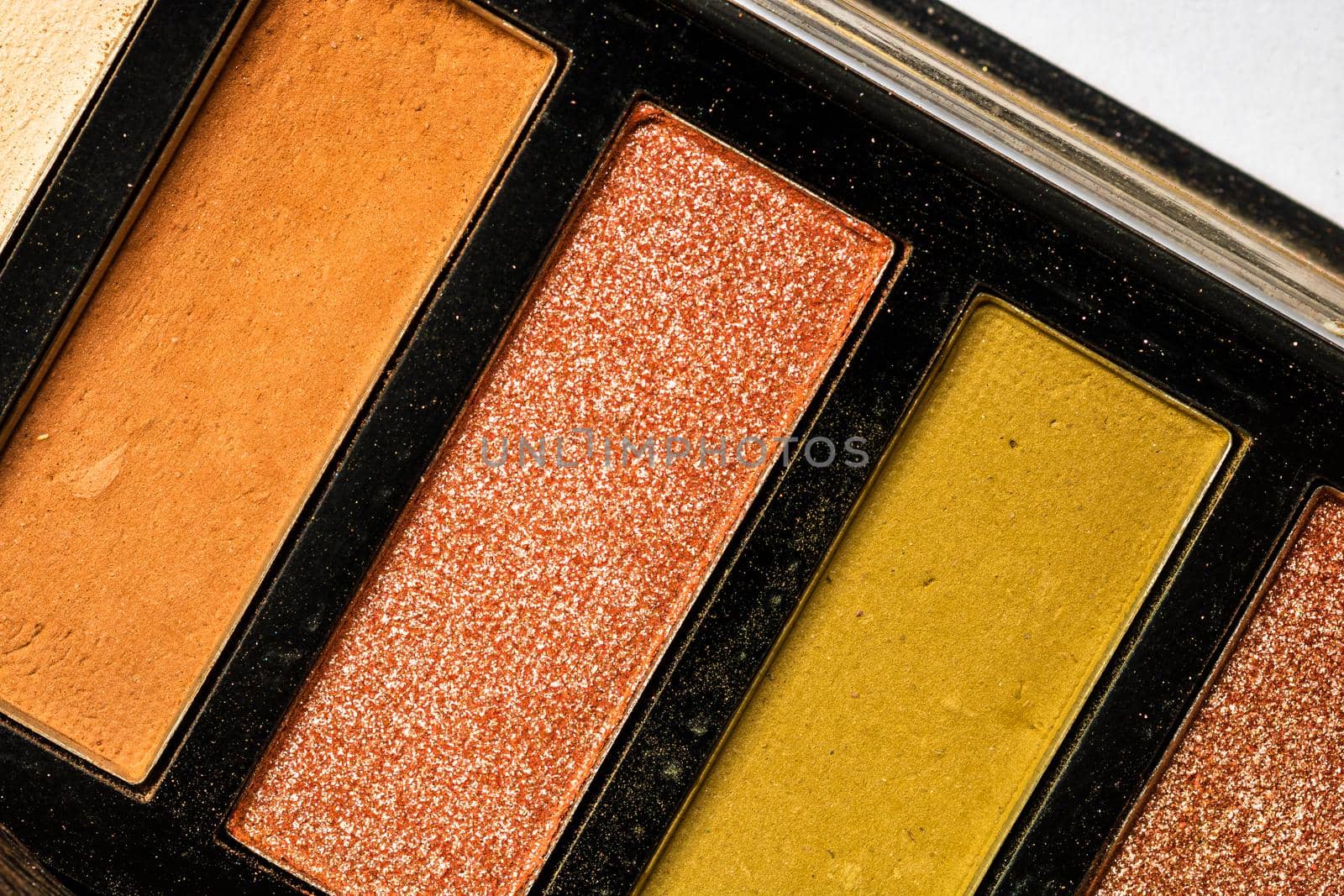 Macro selective focus on old and used make up palette.