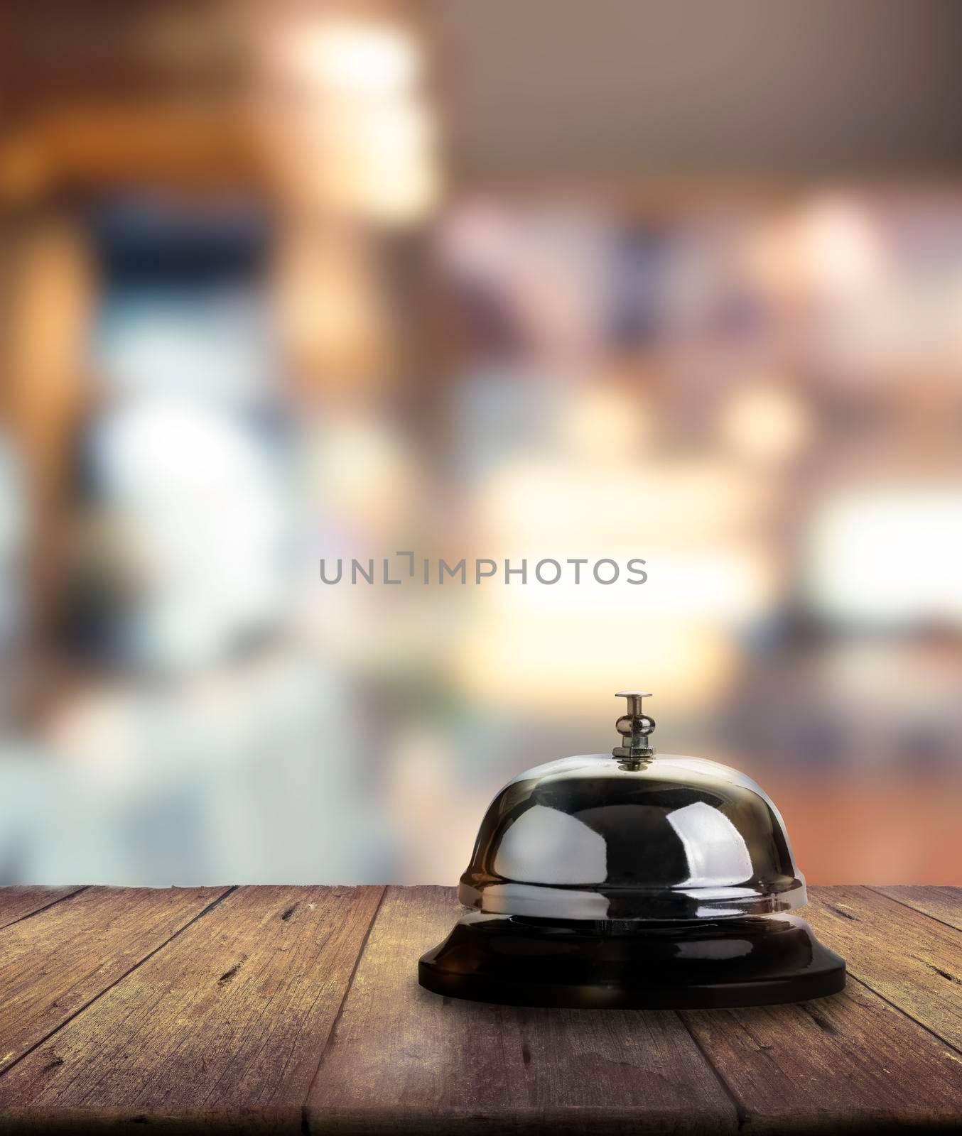 Call bell for service on wooden. Bokeh background