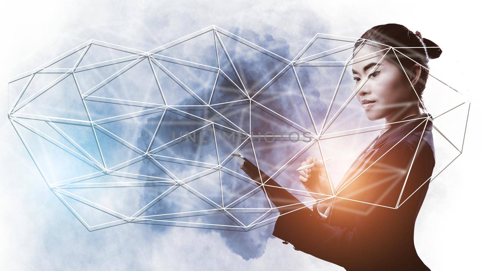 Double exposure of businesswoman holding tablet connect world