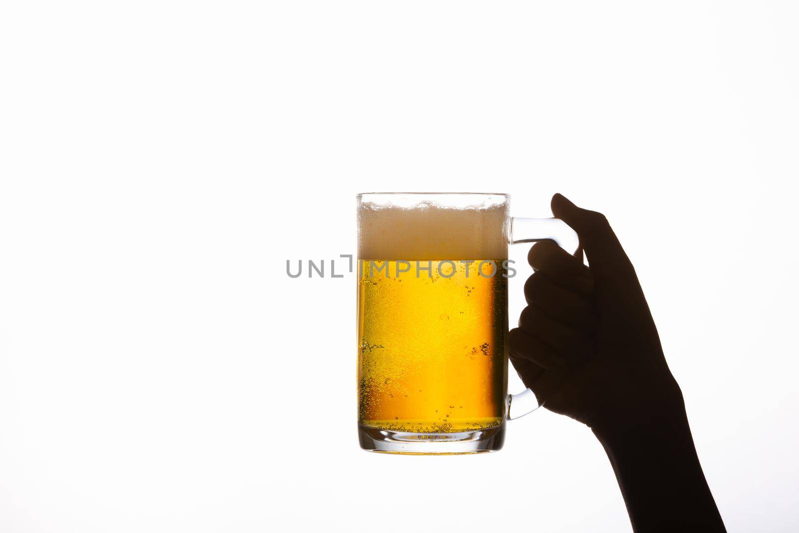 Dark s' hand of woman with a beer mug on white background