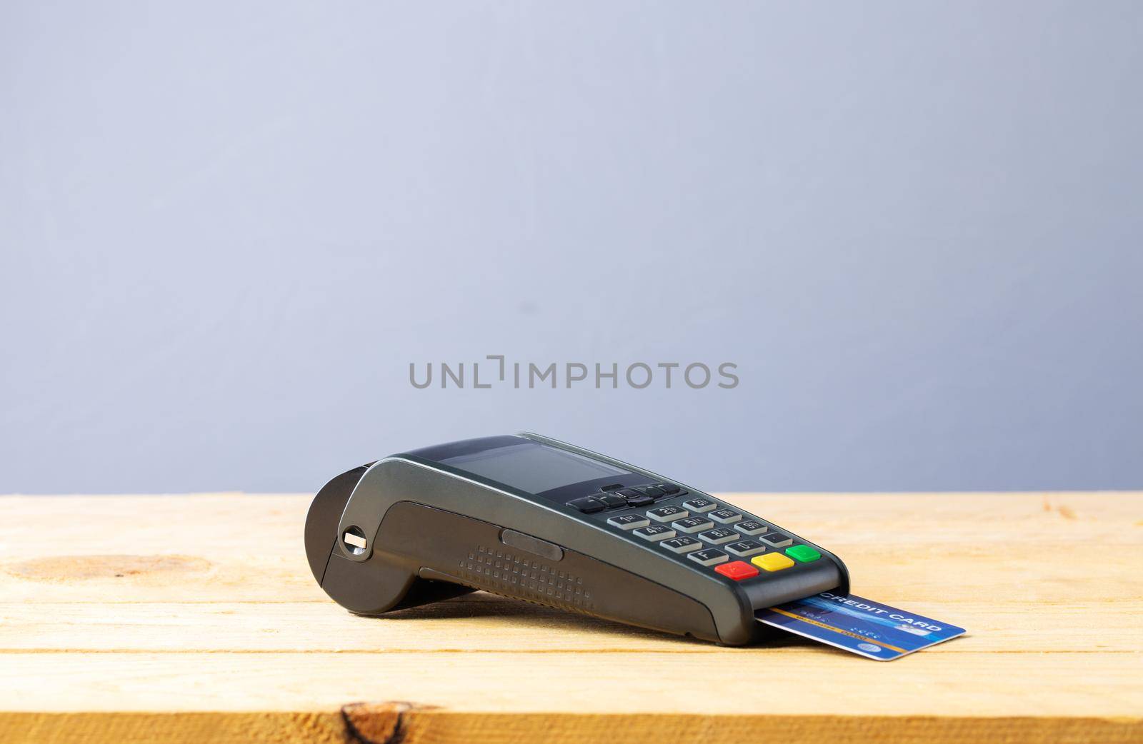 Credit card machine on wood