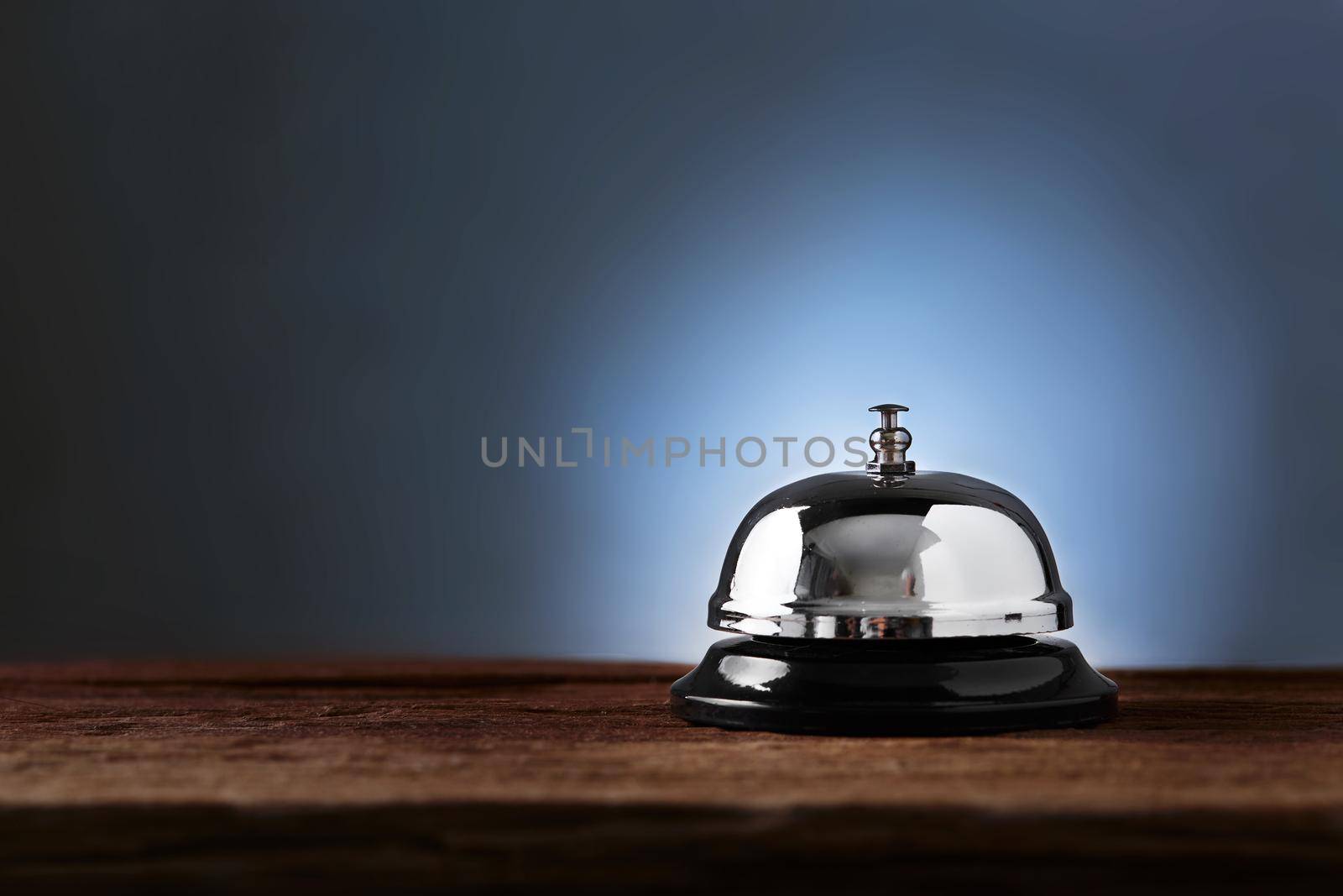 Bell of service on wooden