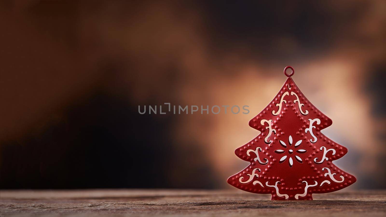 Christmas tree object on wood with blurred wood background